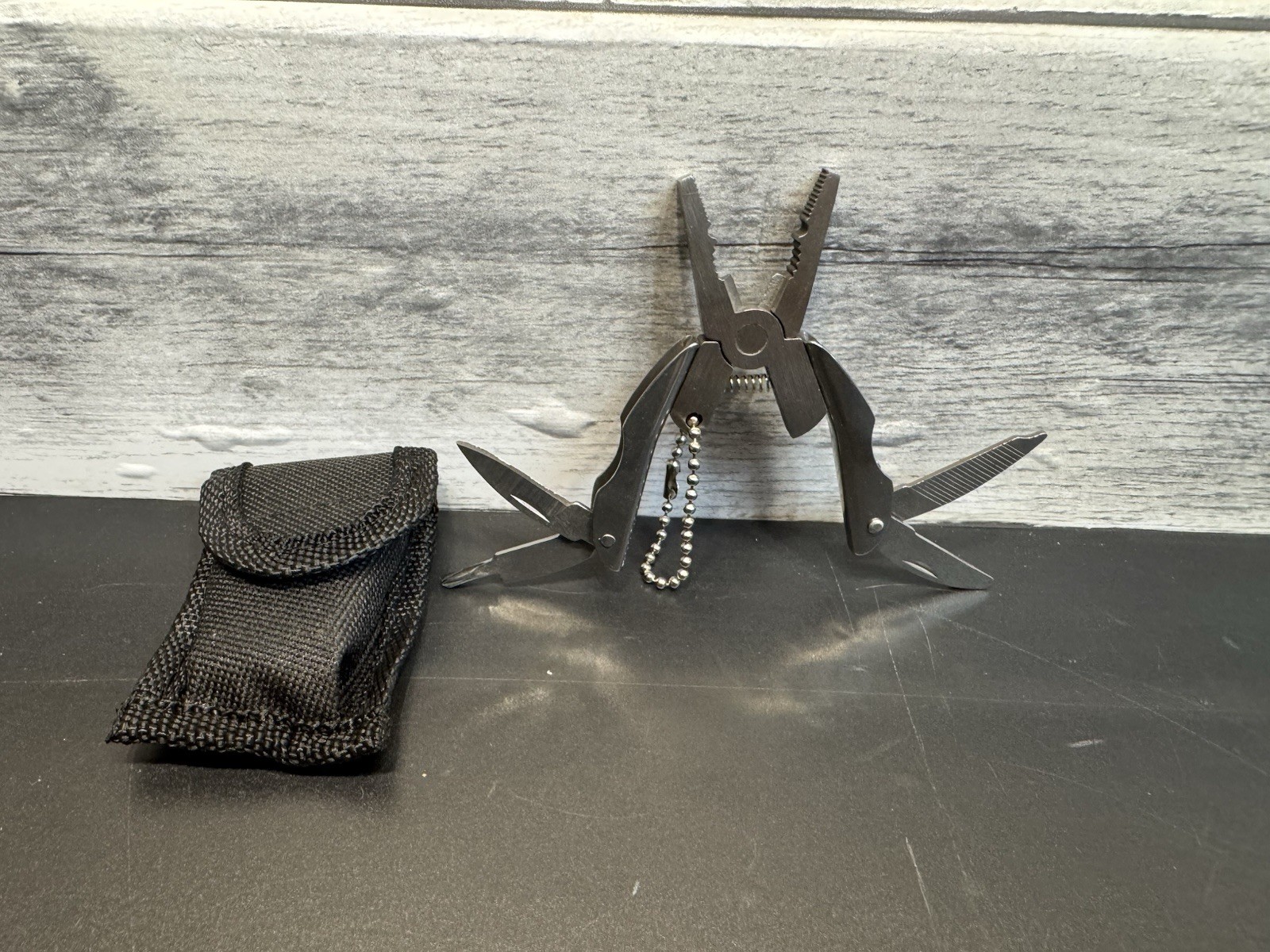 Lot of 4 Tactical Gear Items-Wallet Knife-Multi Tool-Solar Light-Keychain Knife