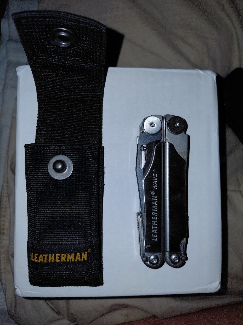 Leatherman BRAND NEW Wave Plus. Silver w/ Black Case. Factory oil still visible!