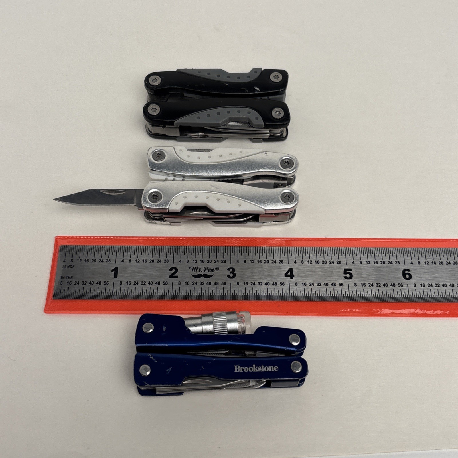 Bundle of 3 mini multitools Danco Brookstone Black White Blue Hunt Camp Hike
