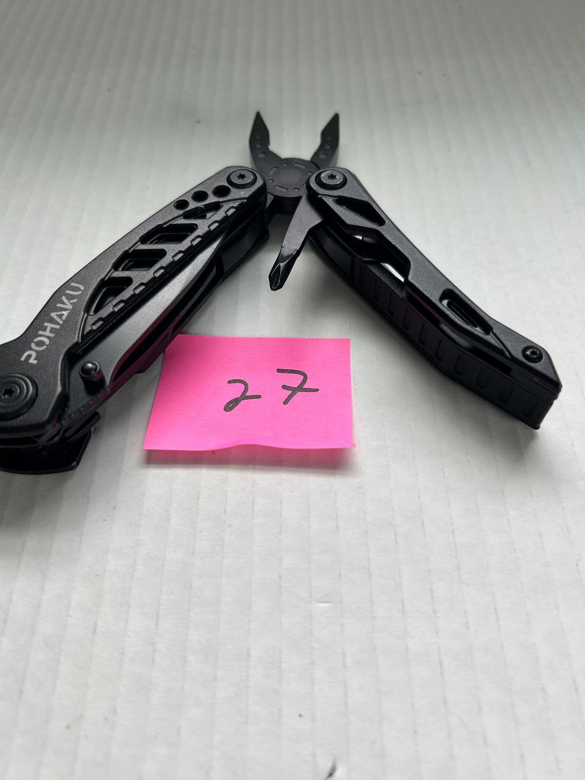 Pohaku Multi Tool with belt holder
