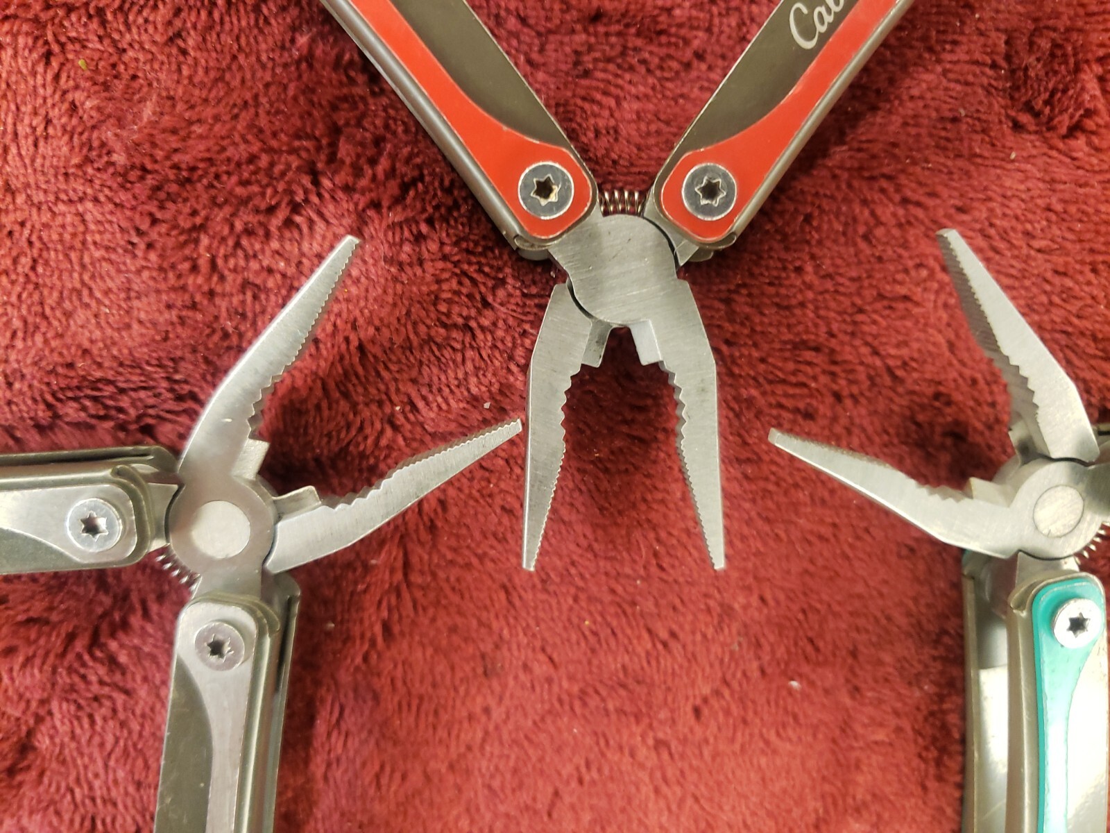 Lot of three Cabela’s Multi Tool Stainless Clear, Teal Green & Red
