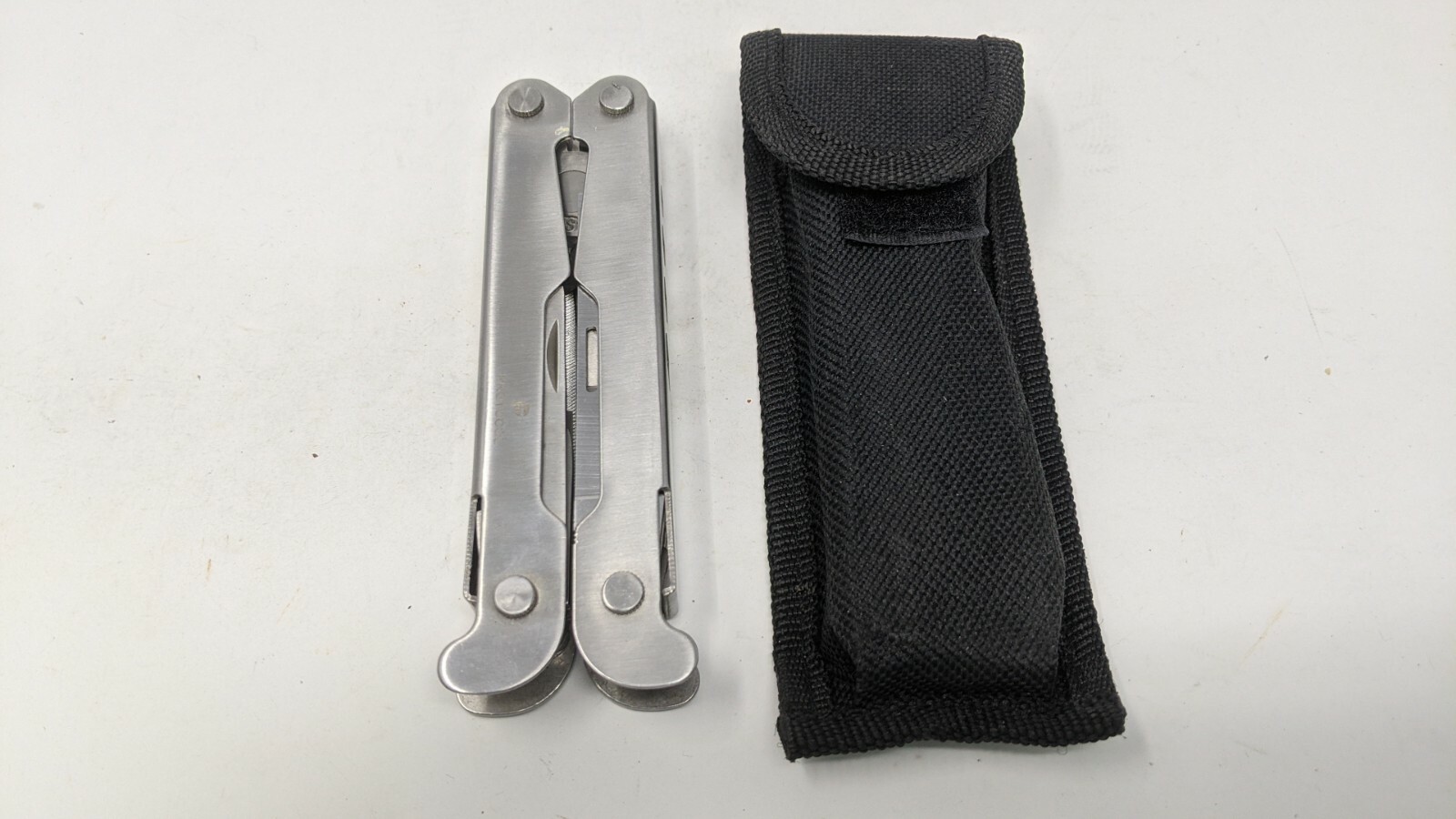 Protocol 14 In 1 Multi Tool Wrench-in-Handle Pliers Saw File Fish Scaler Ruler