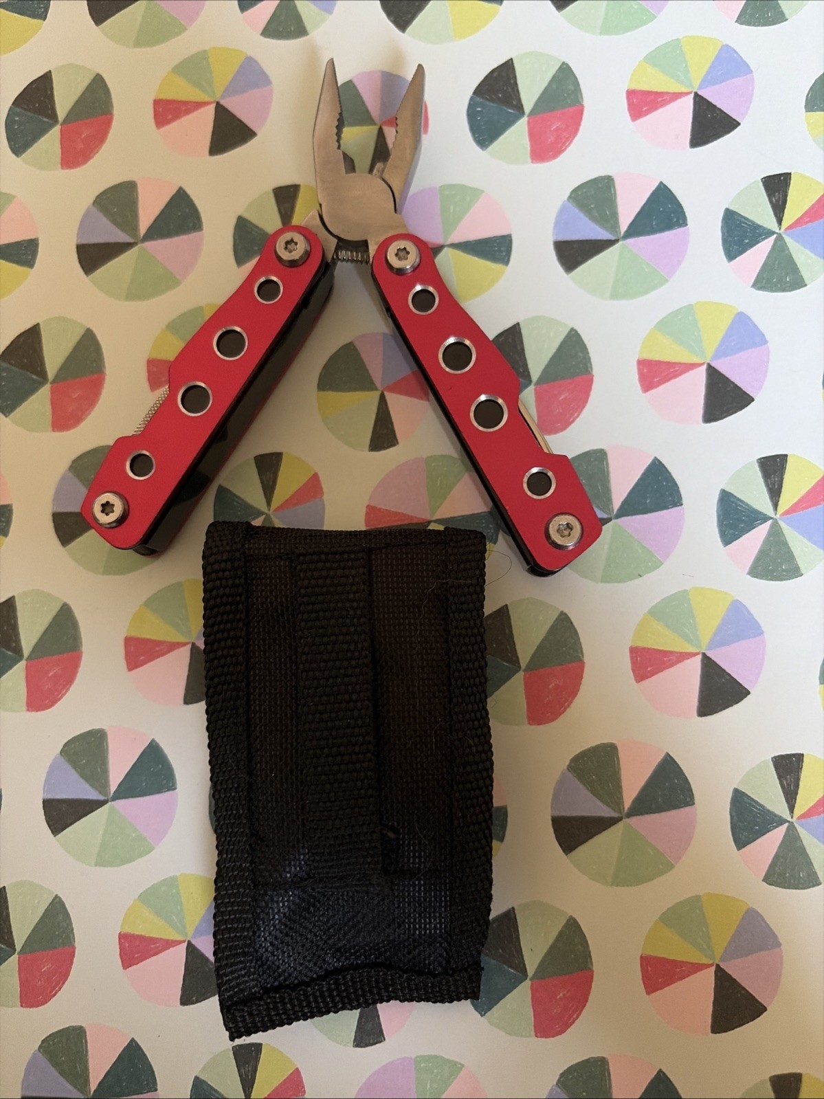 Multi-Tool Knife, Pliers – 11 in 1 Red With Sheath Measures 2 1/2” Closed -New