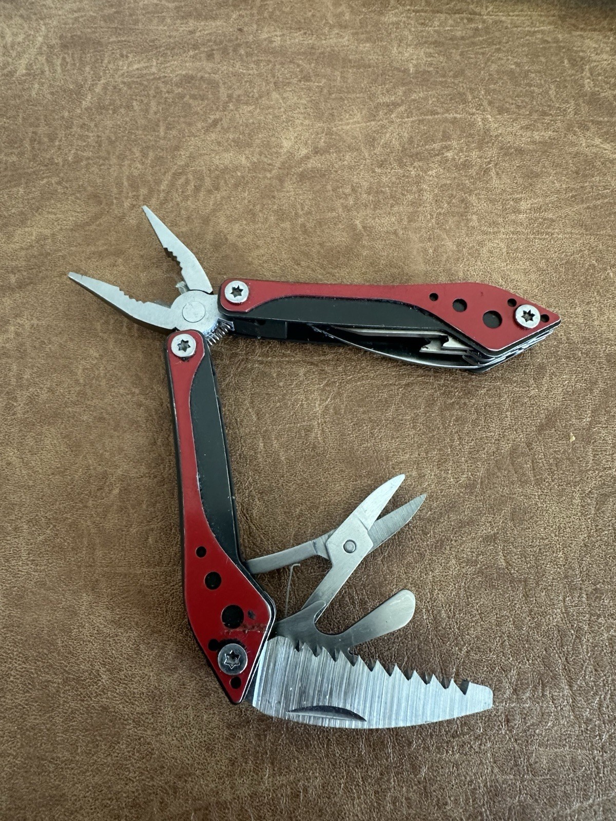 Cabela’s 4-1/2″ Multi-Tool in Red and Black with 7 Tools In One