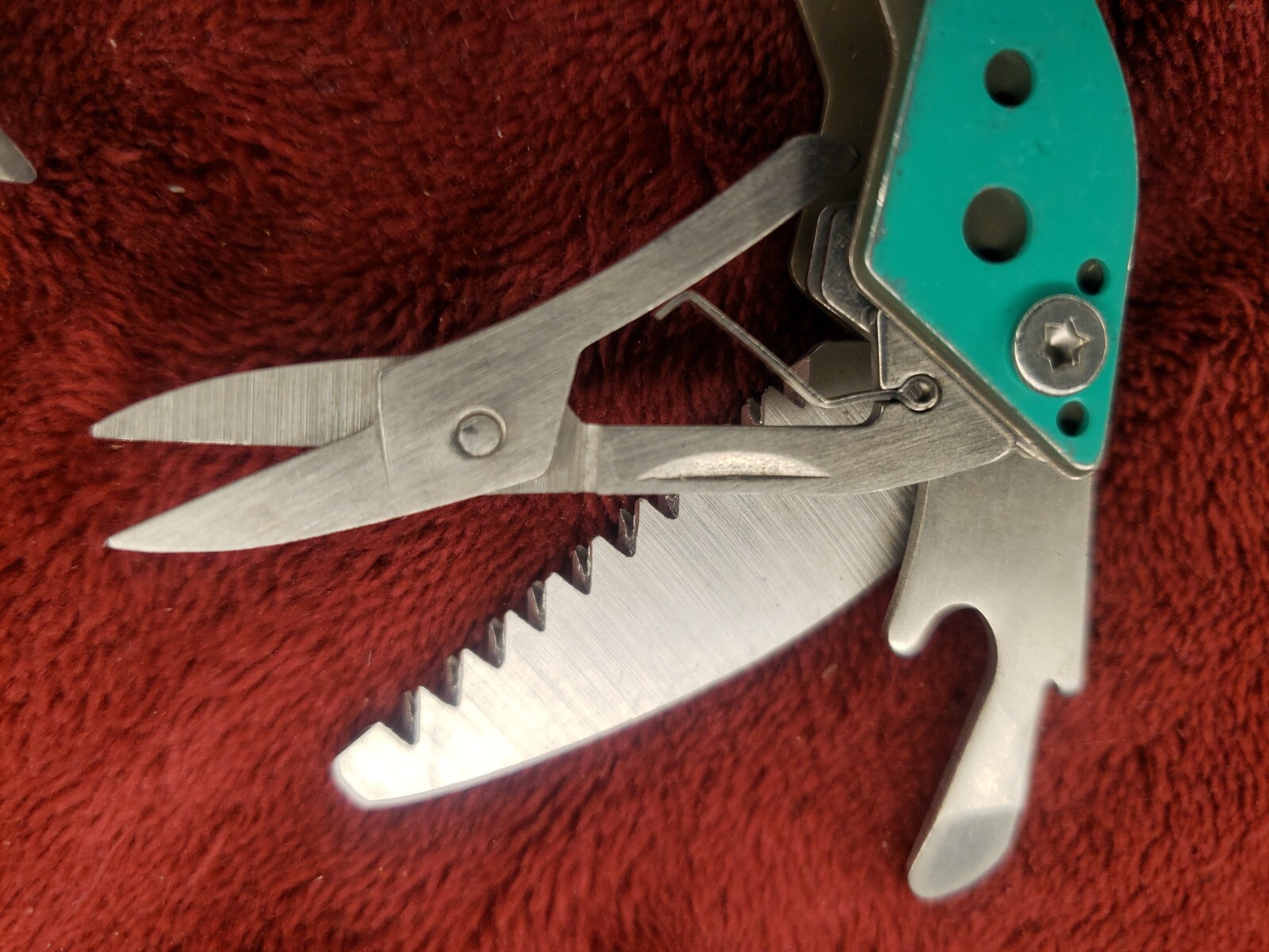 Lot of three Cabela’s Multi Tool Stainless Clear, Teal Green & Red