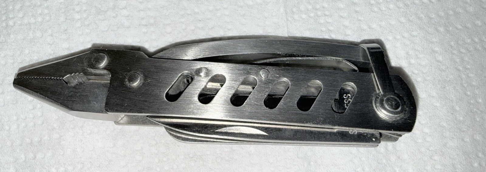 Knife, Classic Multi-tool. Pliers. Wire Cutter. Blade. Saw And More. Nylon Case