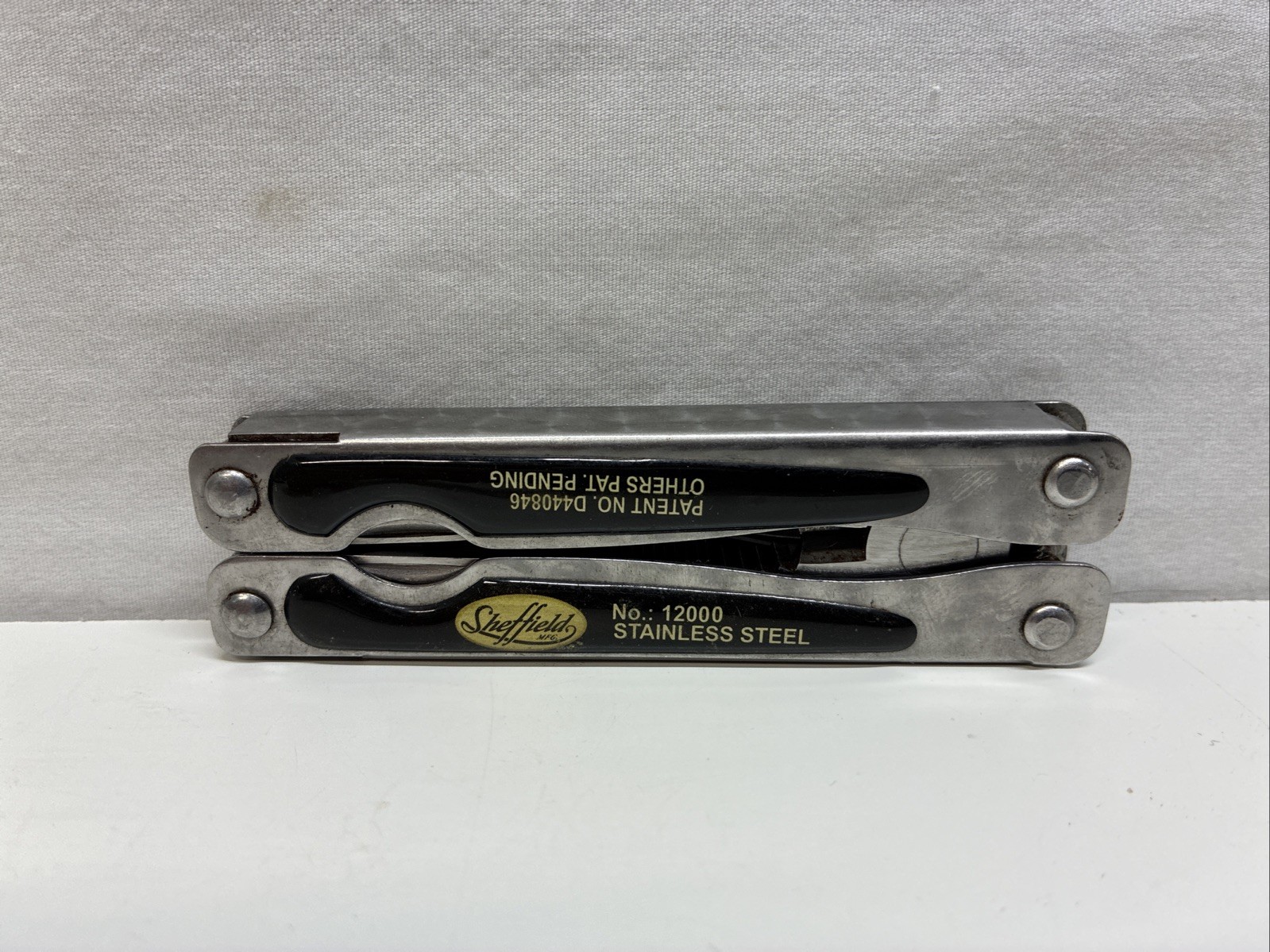 SHEFFIELD MODEL 12000 STAINLESS STEEL FOLDING MULTI-TOOL