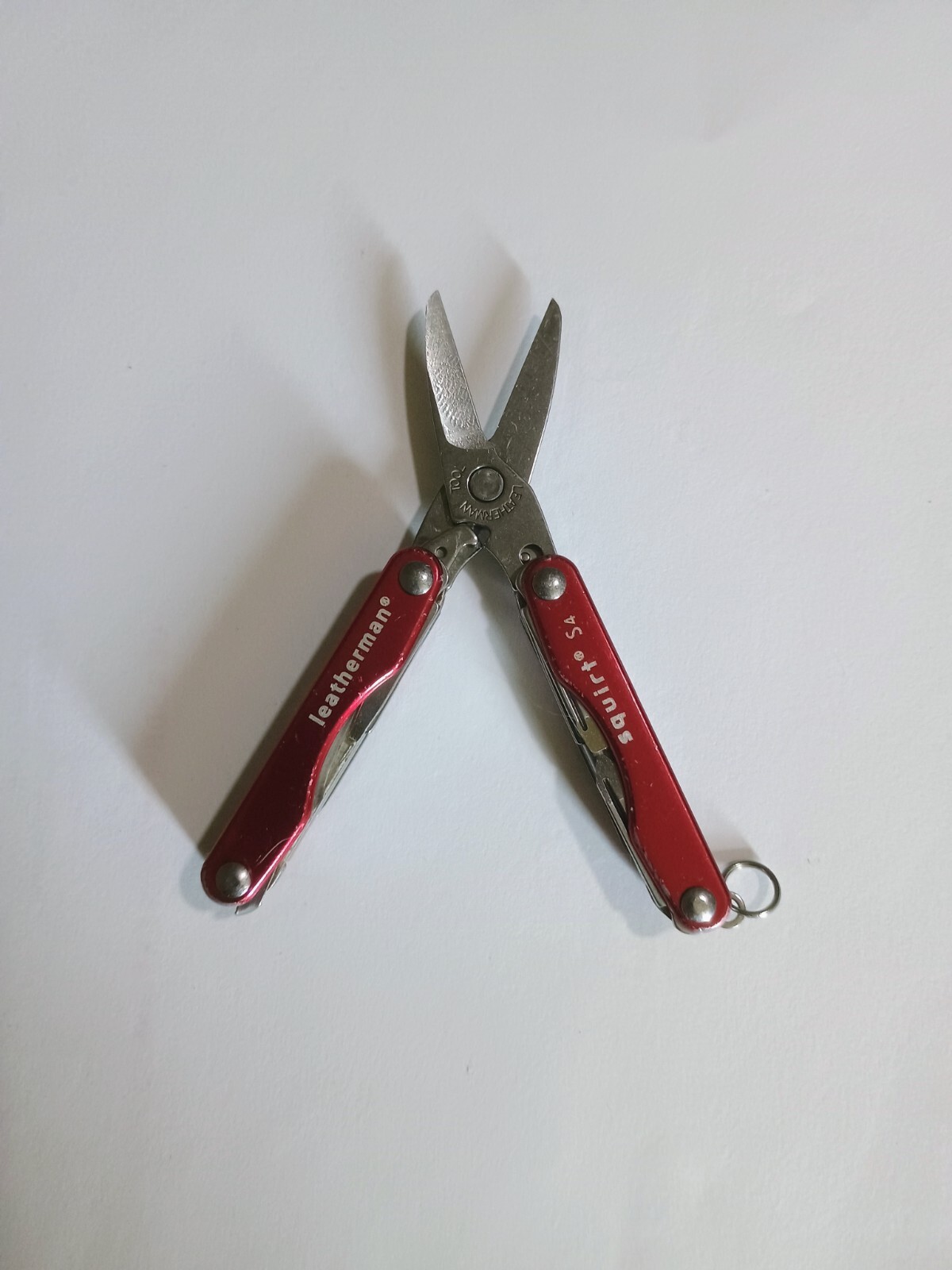 Leatherman Squirt S4 Multi-Tool. Red. Used