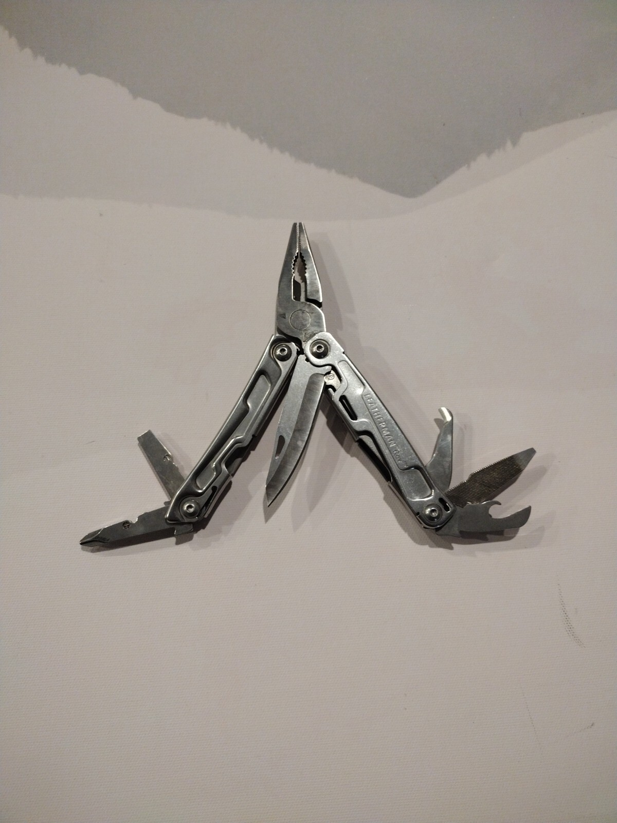 Leatherman REV 14 Tools Multi-Tool – Stainless Steel with Nylon Sheath Excellent