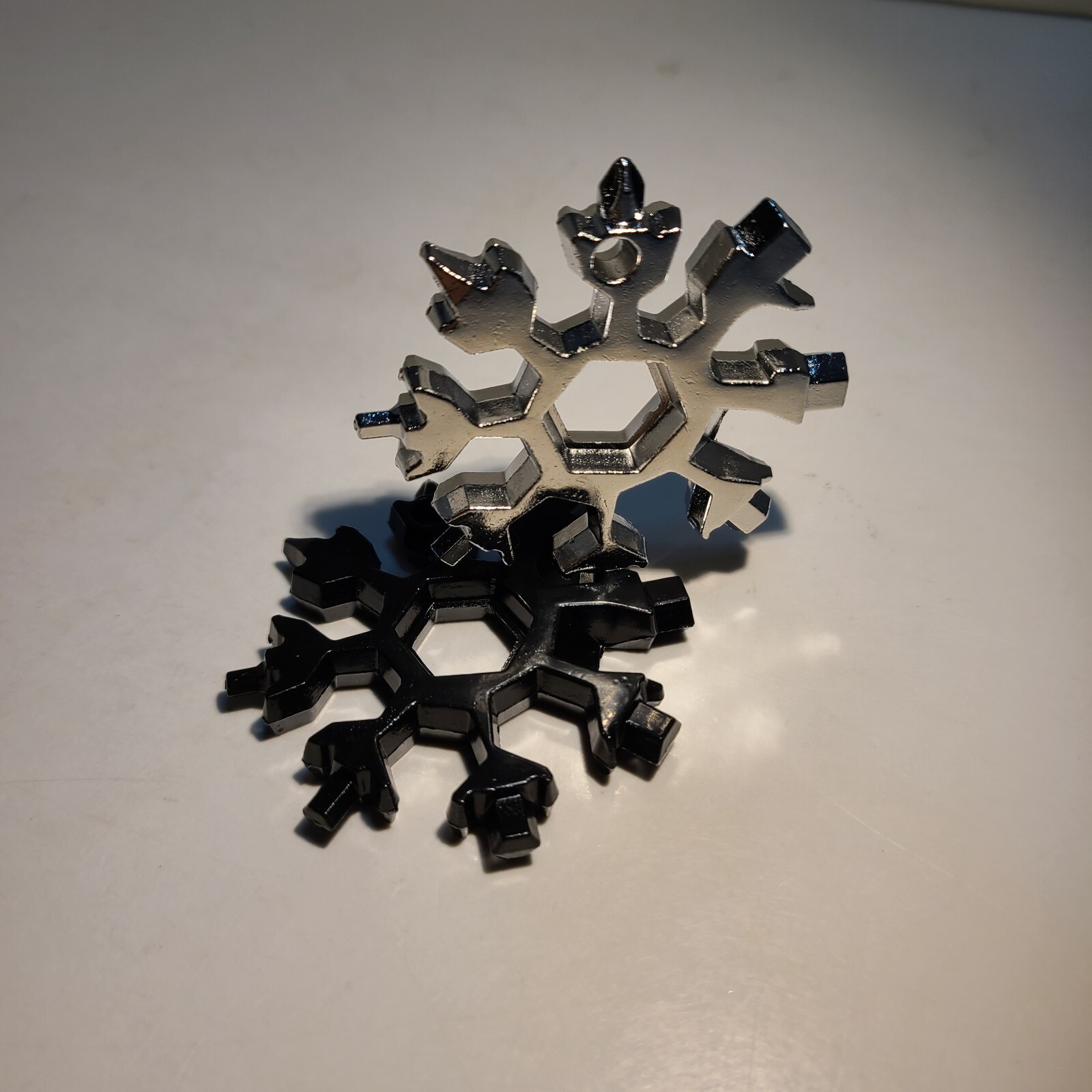 18-in-1 Stainless Steel Snowflake Multi-Repair Tool with Bottle Opener, etc.