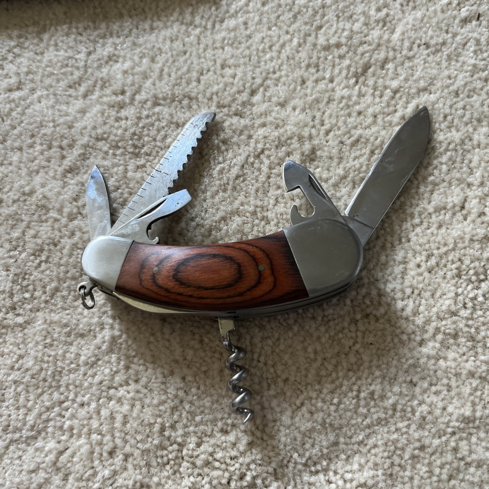Camping Knife Wooden Handle with 7 Different Tools Attached with a Hanging Ring