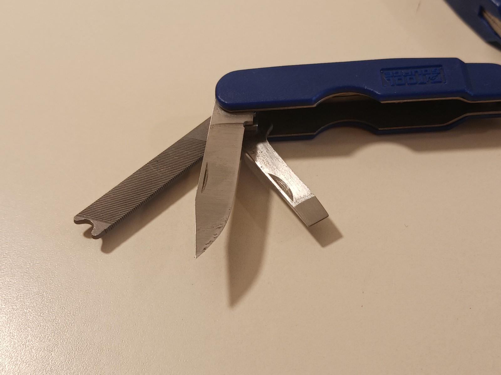 Tool Source 7-in-1 Mini Multi-Tool Pliers Knife Screwdriver File Bottle Opener