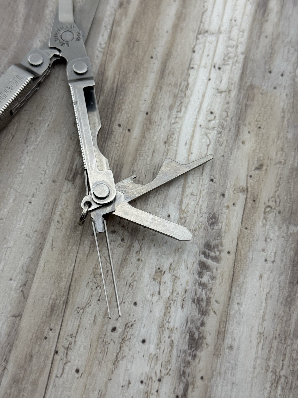 Leatherman Micra Multi-Tool Knife Scissors Key Ring Stainless Lexus logo