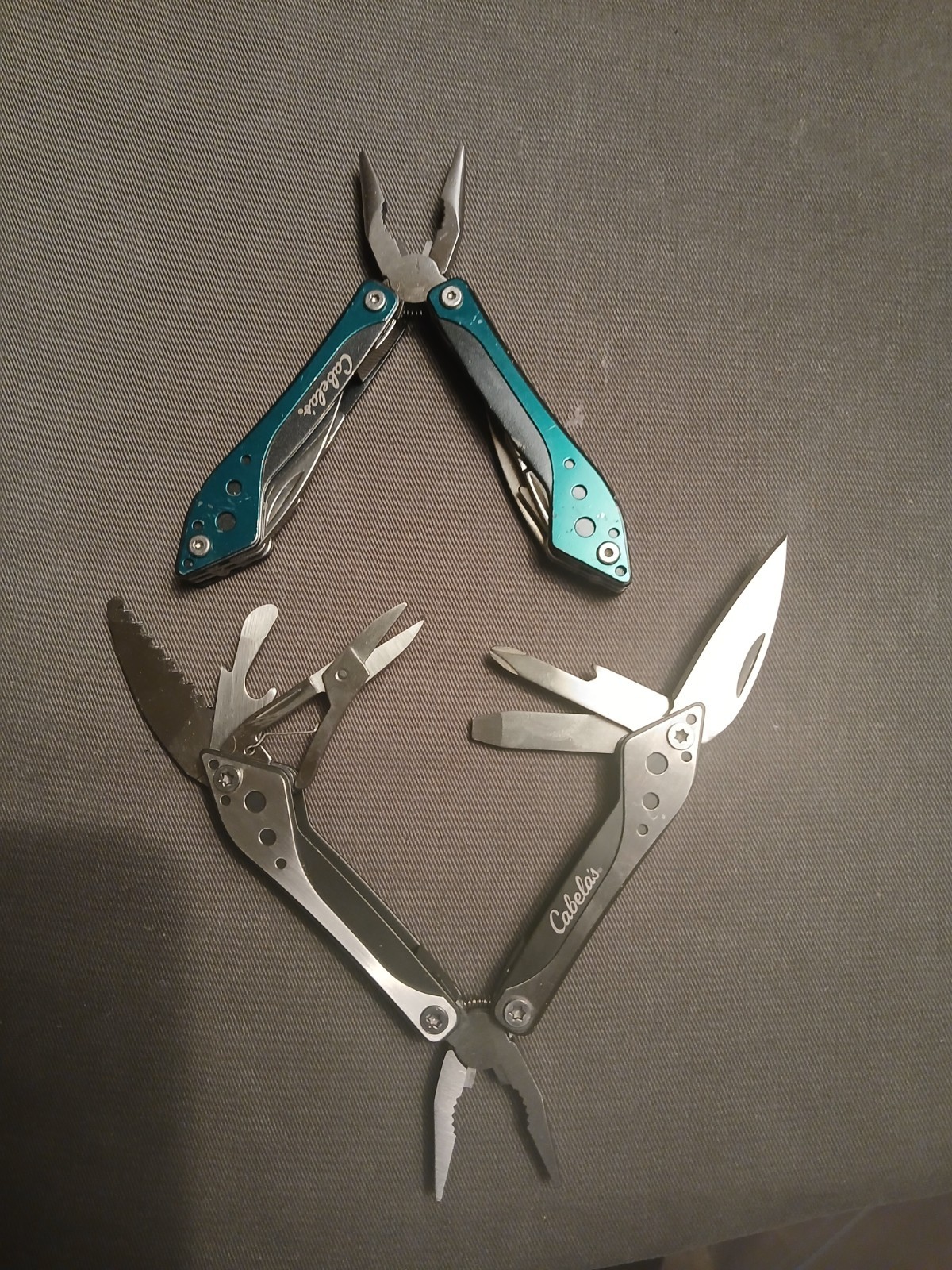 Lot of 2 Cabela’s multi-Tool 1) Silver 1) Green With Cases/Unused