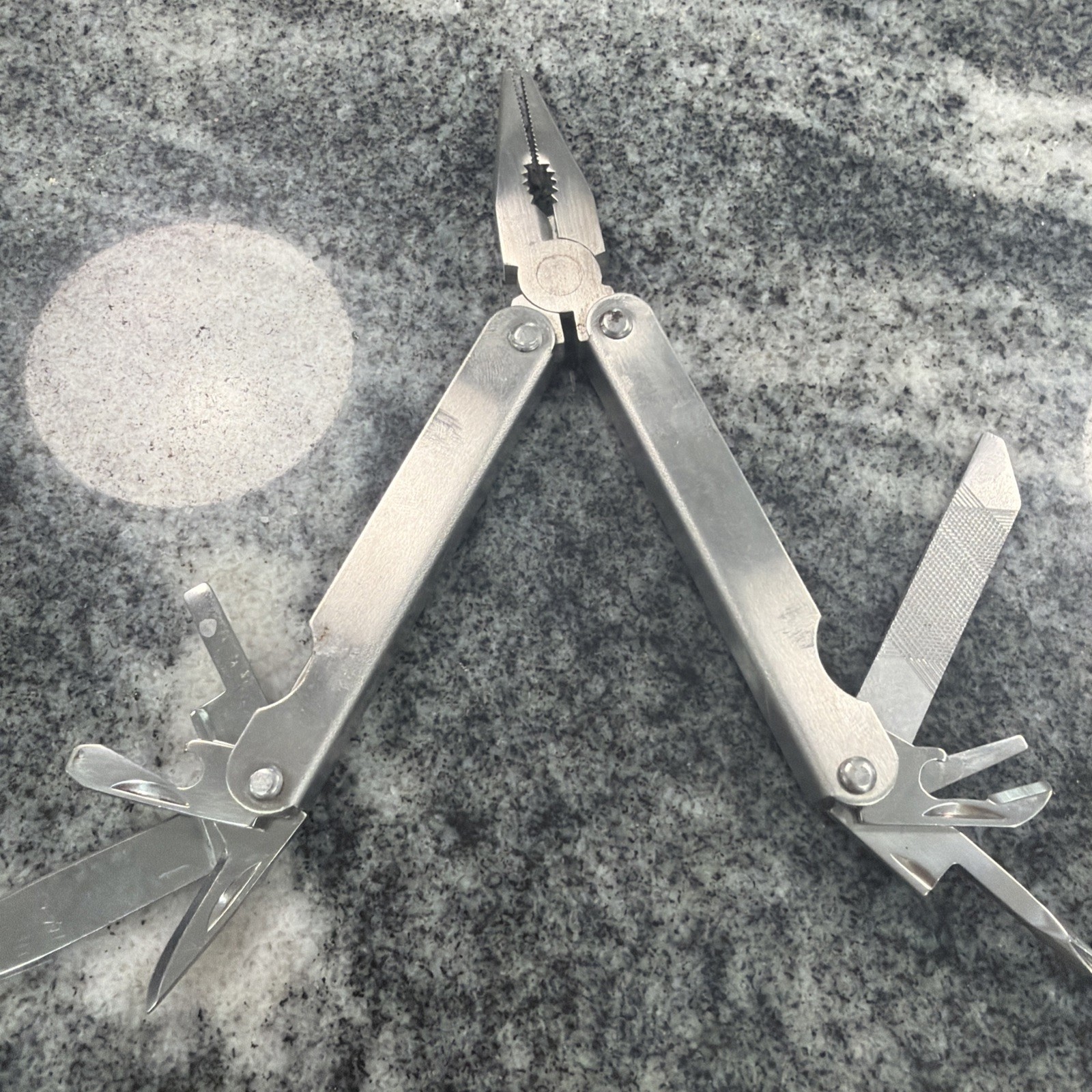 9 Tool Stainless Steel Multi Tool. Made In The Same Fashion As Original Leather