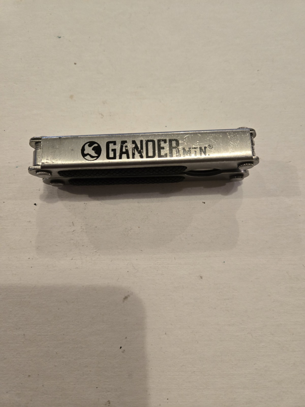Gander Mountain 10-in-1 Multi Tool, Silver With Black Rubber Inlay Handles
