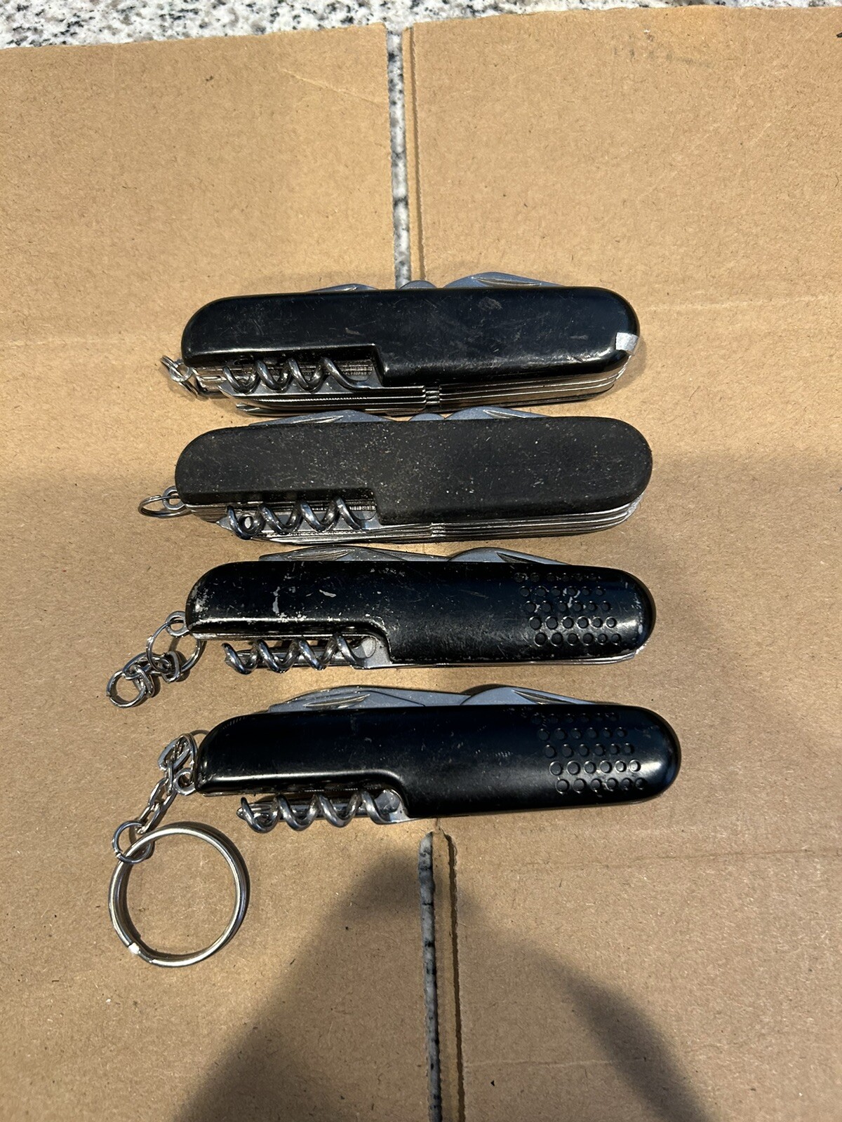 Multi tools – Lot of 4 – various engravings – Used