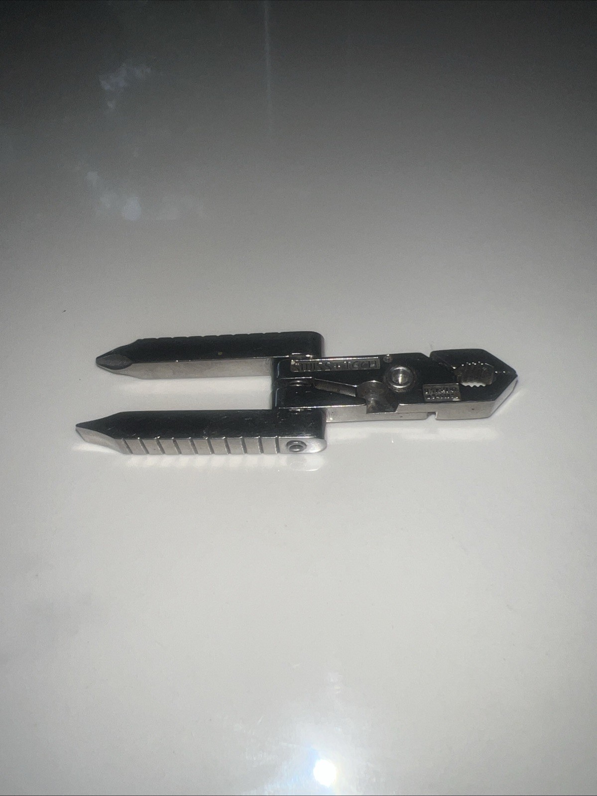 Swiss-Tech 8-in-1 multi-tool with Pliers and screwdriver