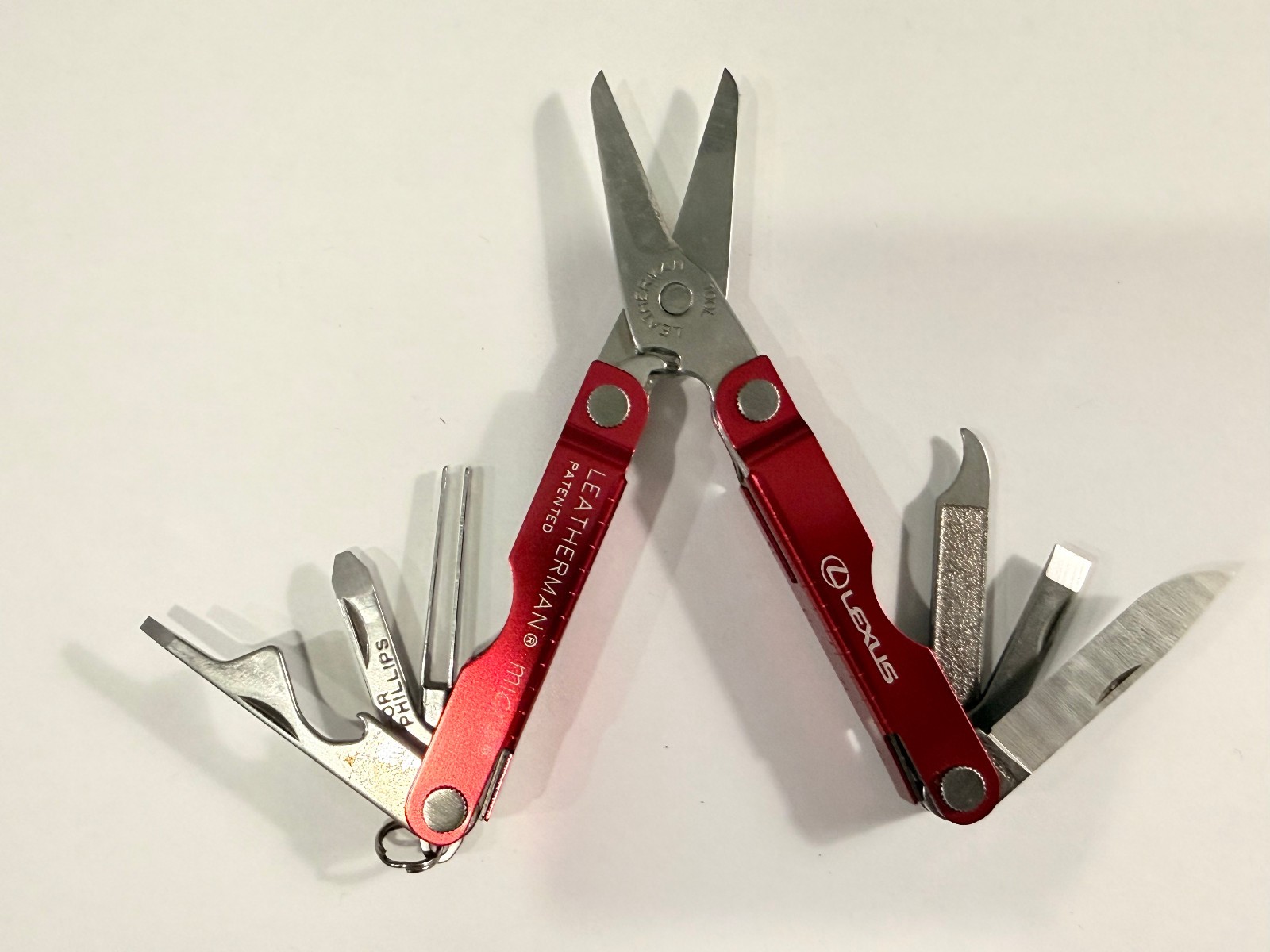 LEATHERMAN MICRA RED METALLIC MULTI-TOOL – ADVERTISEMENT LEXUS