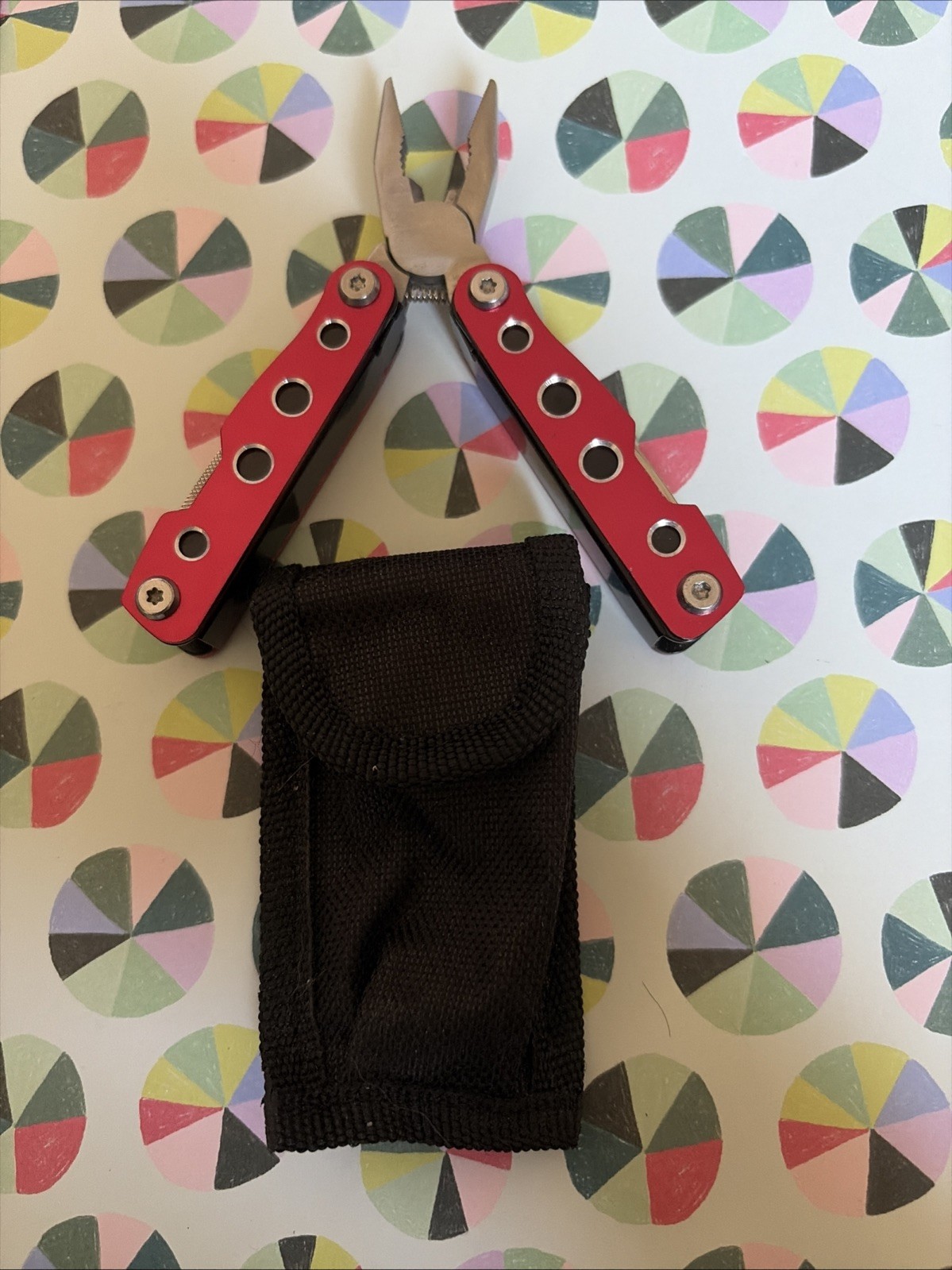 Multi-Tool Knife, Pliers – 11 in 1 Red With Sheath Measures 2 1/2” Closed -New