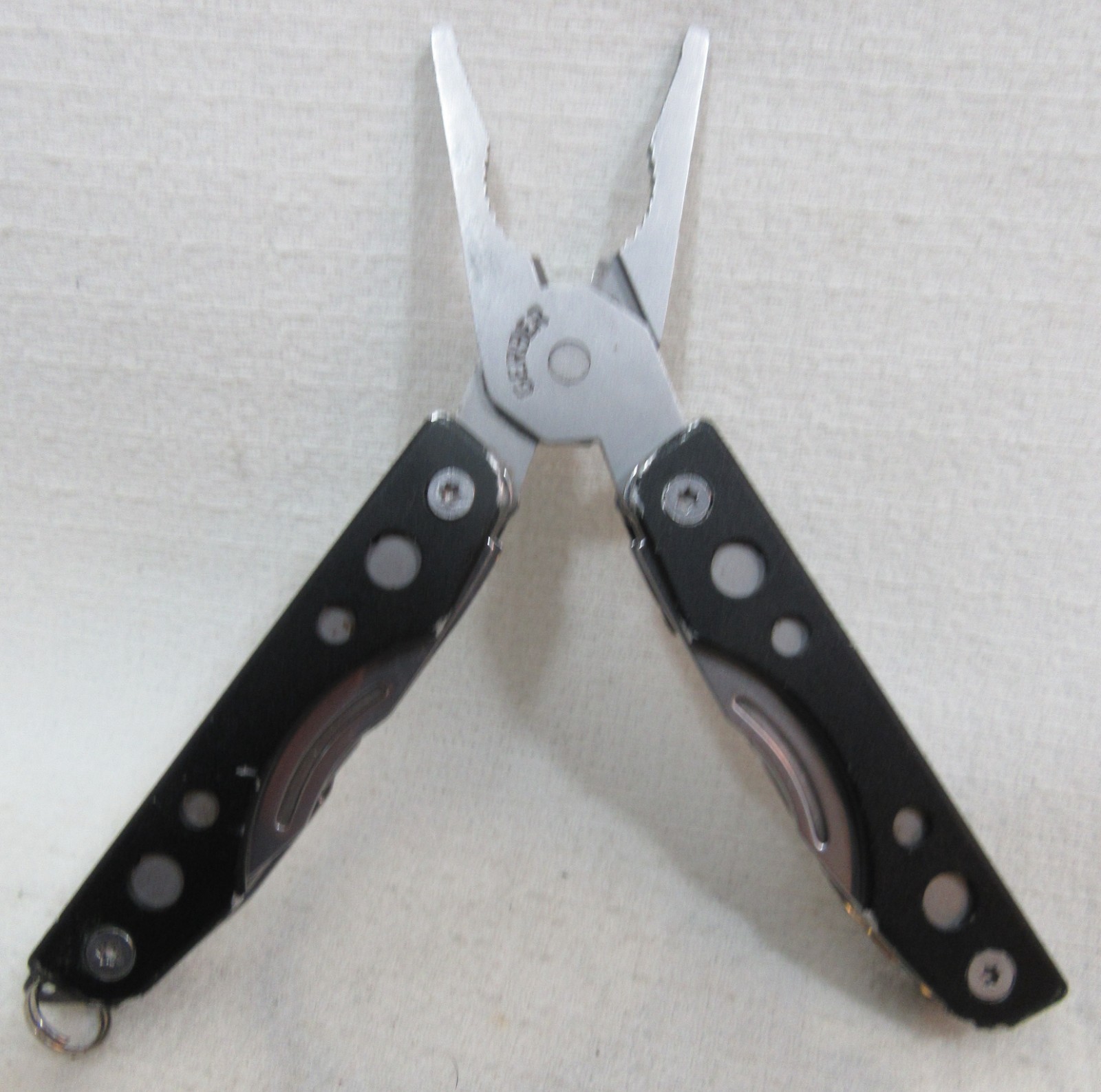 Gerber Clutch Mini Multi Tool With Pliers, Blade, Nail File & More
