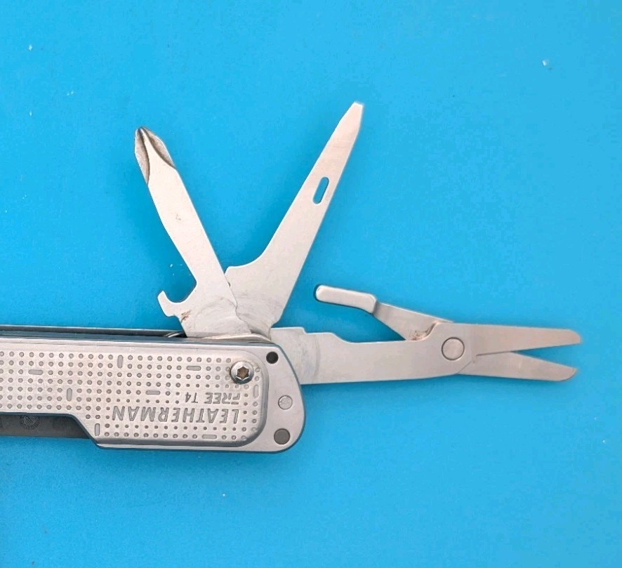 Leatherman FREE T4 Pocket Knife Multi-tool! Stainless! RETIRED!
