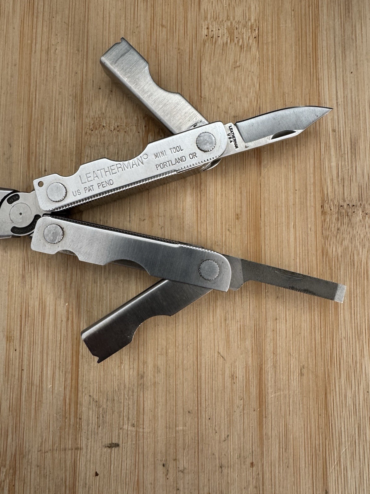 Leatherman MINI TOOL multitool. Variant w/US PAT PEND on Both Sides