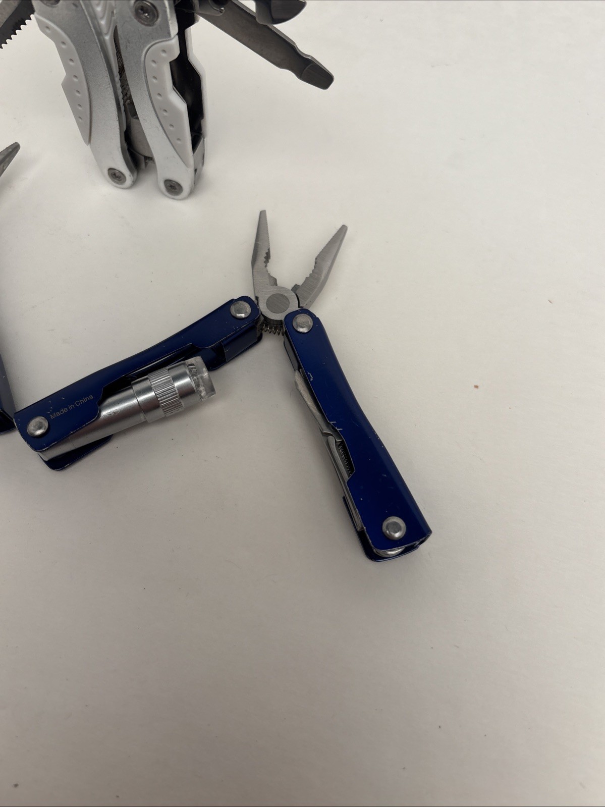 Lot Of 4 Different Function Multi-Tools Winchester Nail Clipper & Wood Grain