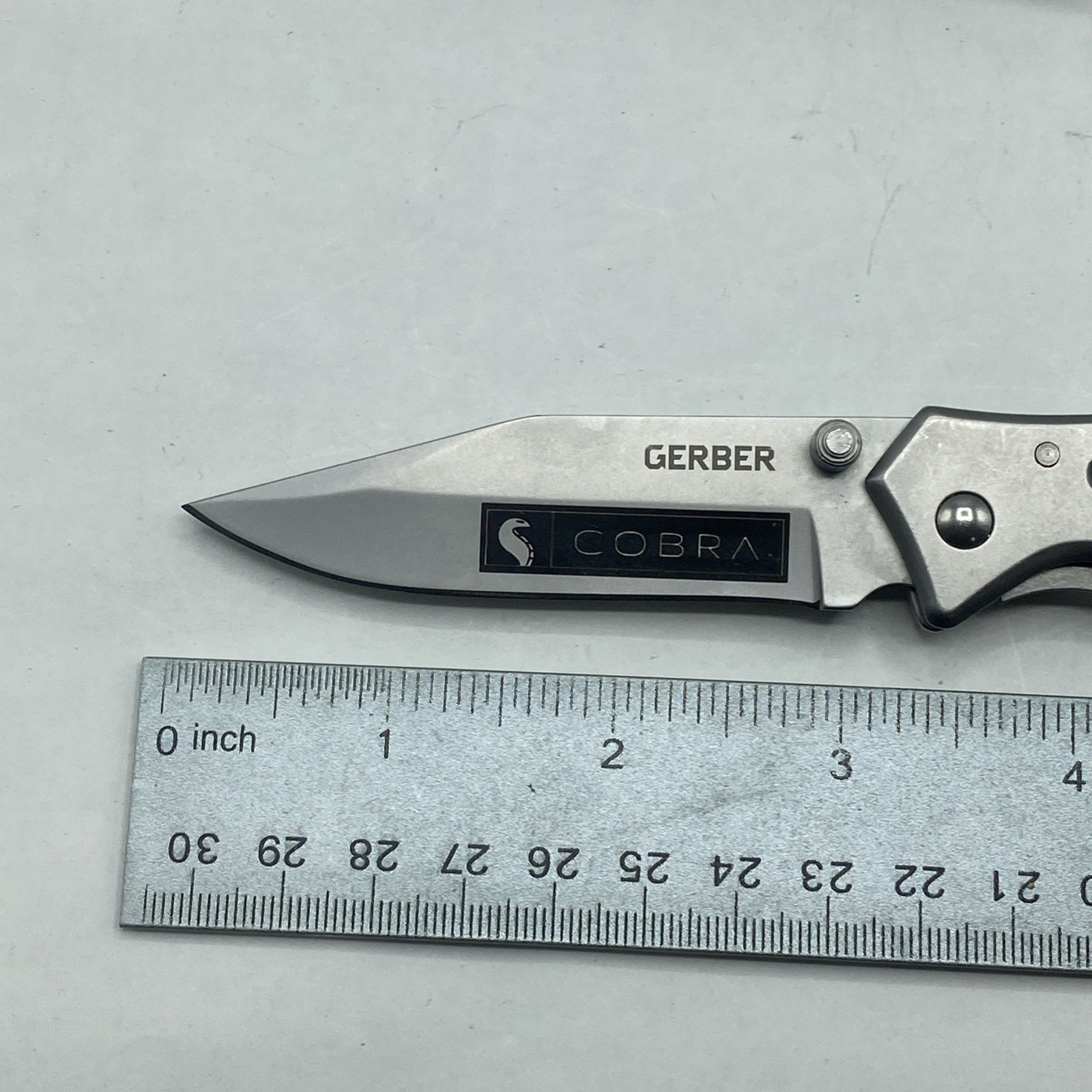 Gerber Suspension NXT & Paraframe I Knife Logo Combo – Silver