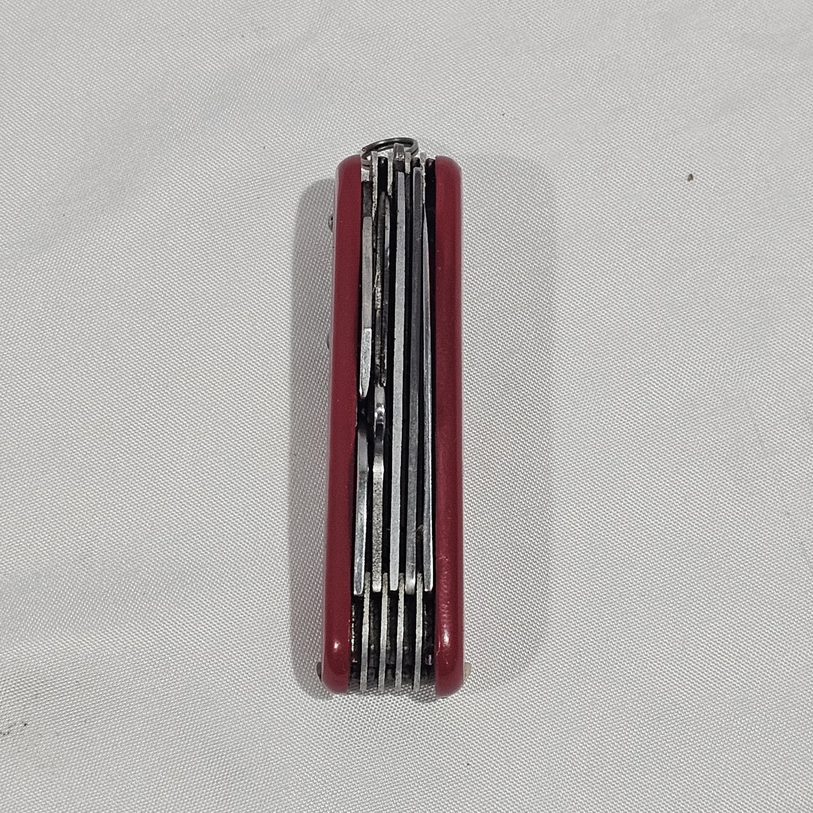 Red Multi-Tool Knife with Scissors, Serrated Knife, Corkscrew, Bottle Opener