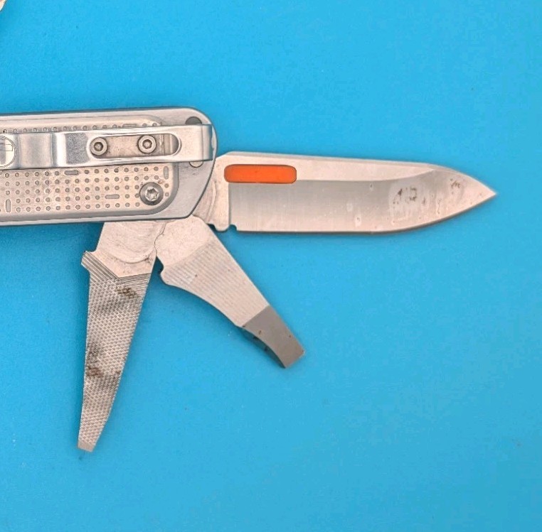 Leatherman FREE T4 Pocket Knife Multi-tool! Stainless! RETIRED!