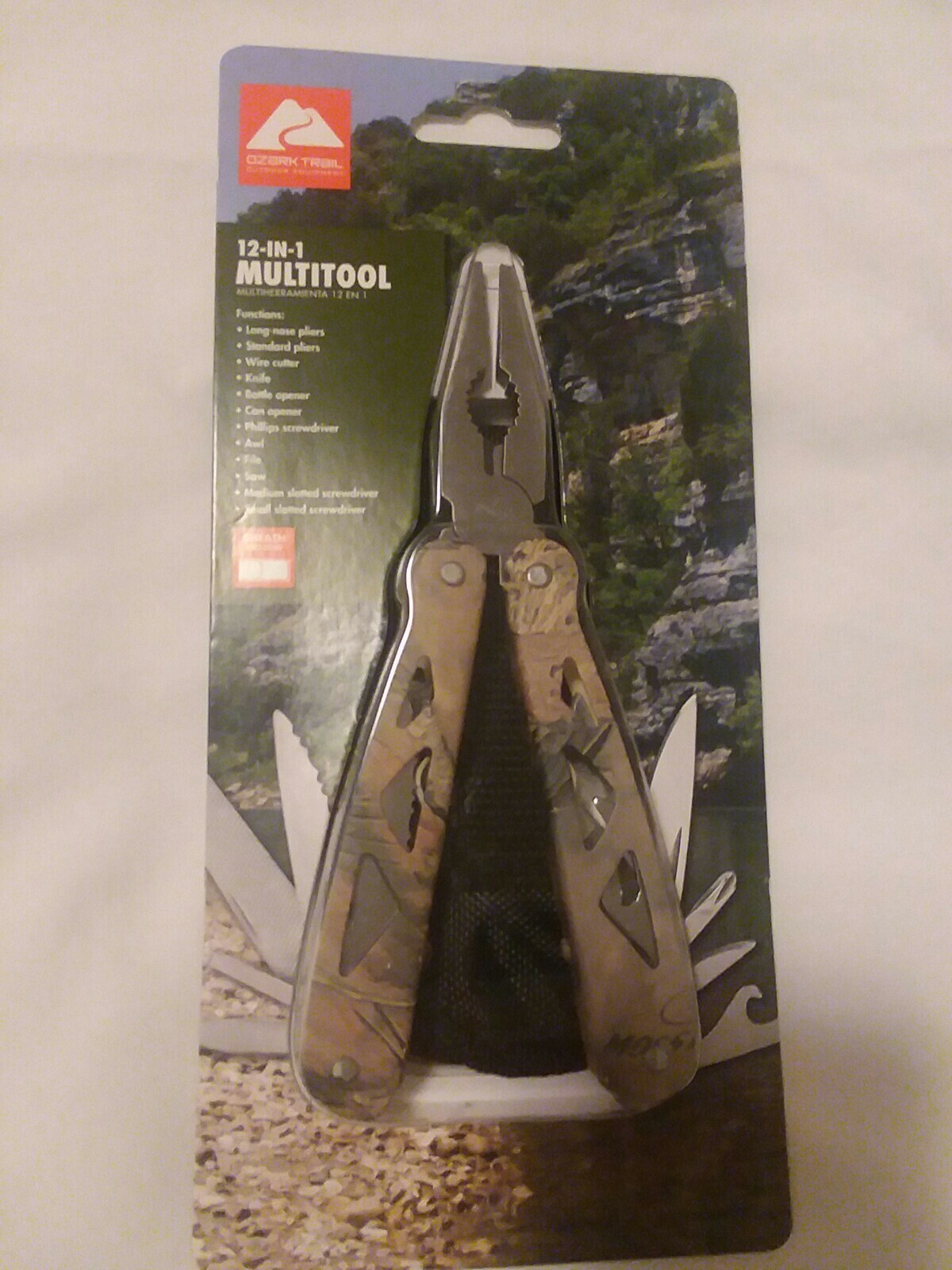 Ozark Trail 12-in-1 Multi Tool with Nylon Black Sheath. Green camo handle.