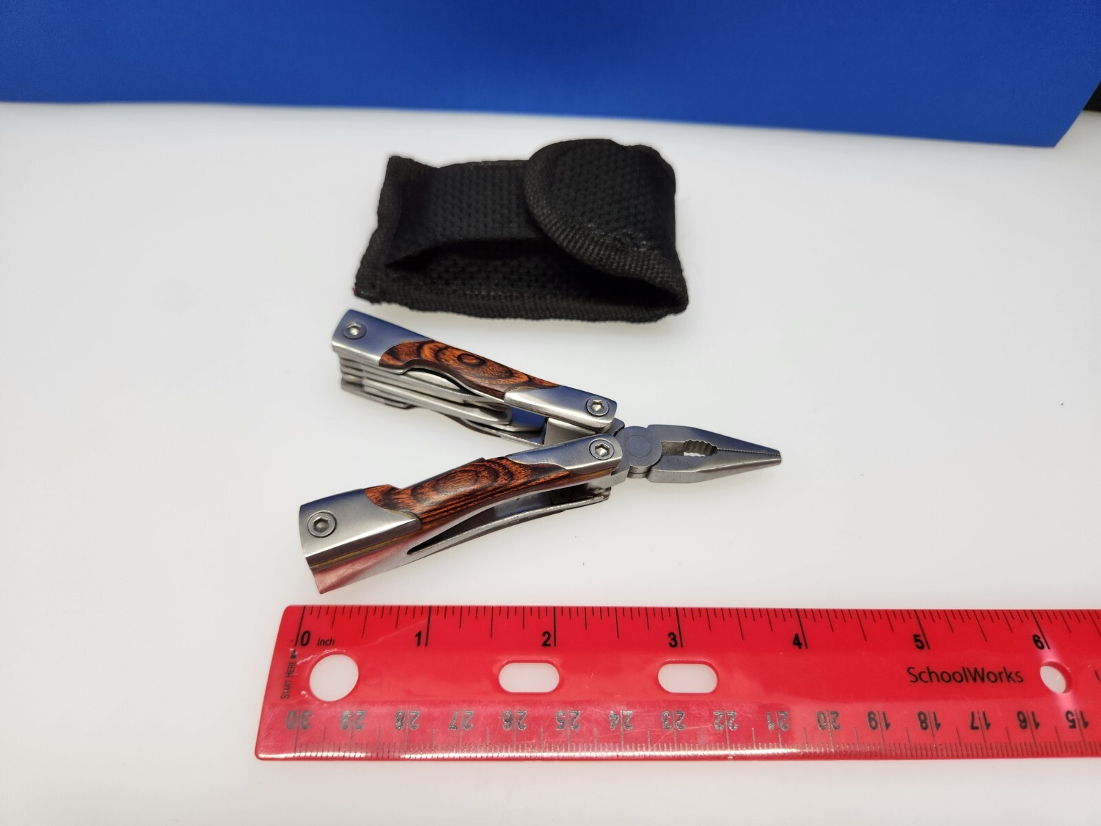 Multi Tool Pliers Saw Screwdriver More Black Nylon Sheath Woodgrain Smaller