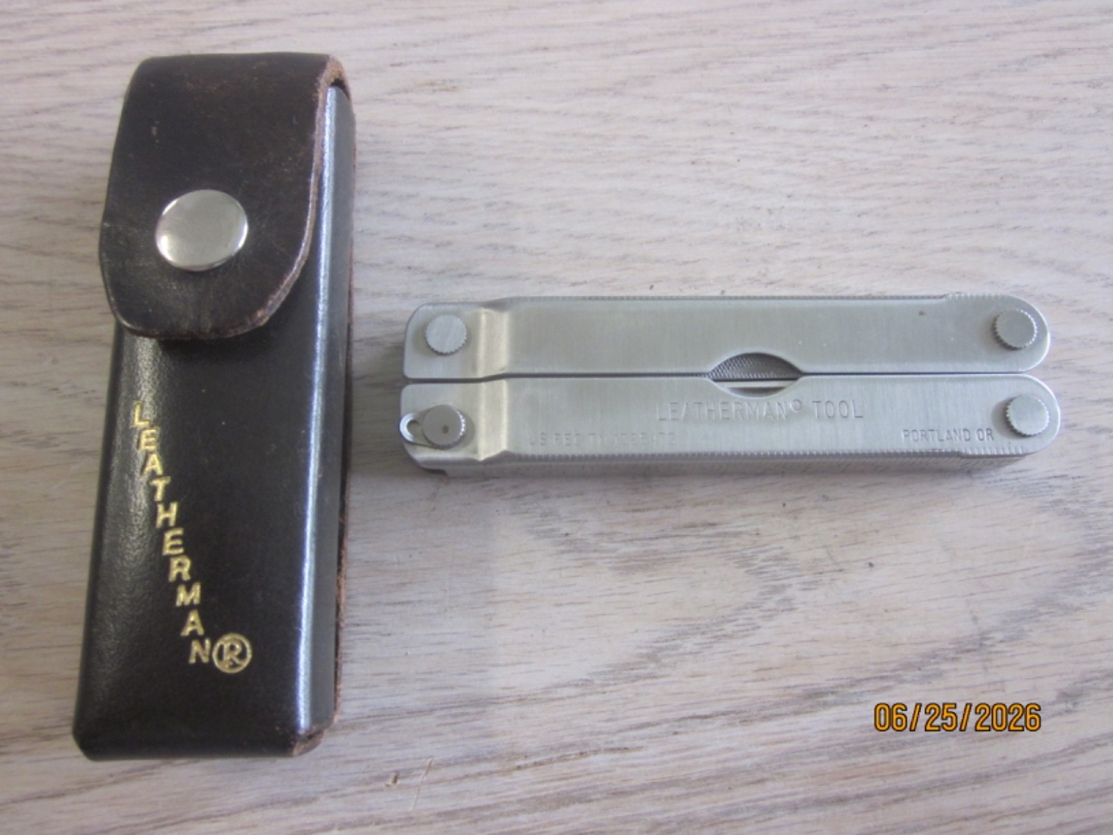 VTG ORIG. LEATHERMAN DATED 03-1995 MULTI PLIERS TOOL W/BROWN CASE “LOOKS UNUSED”