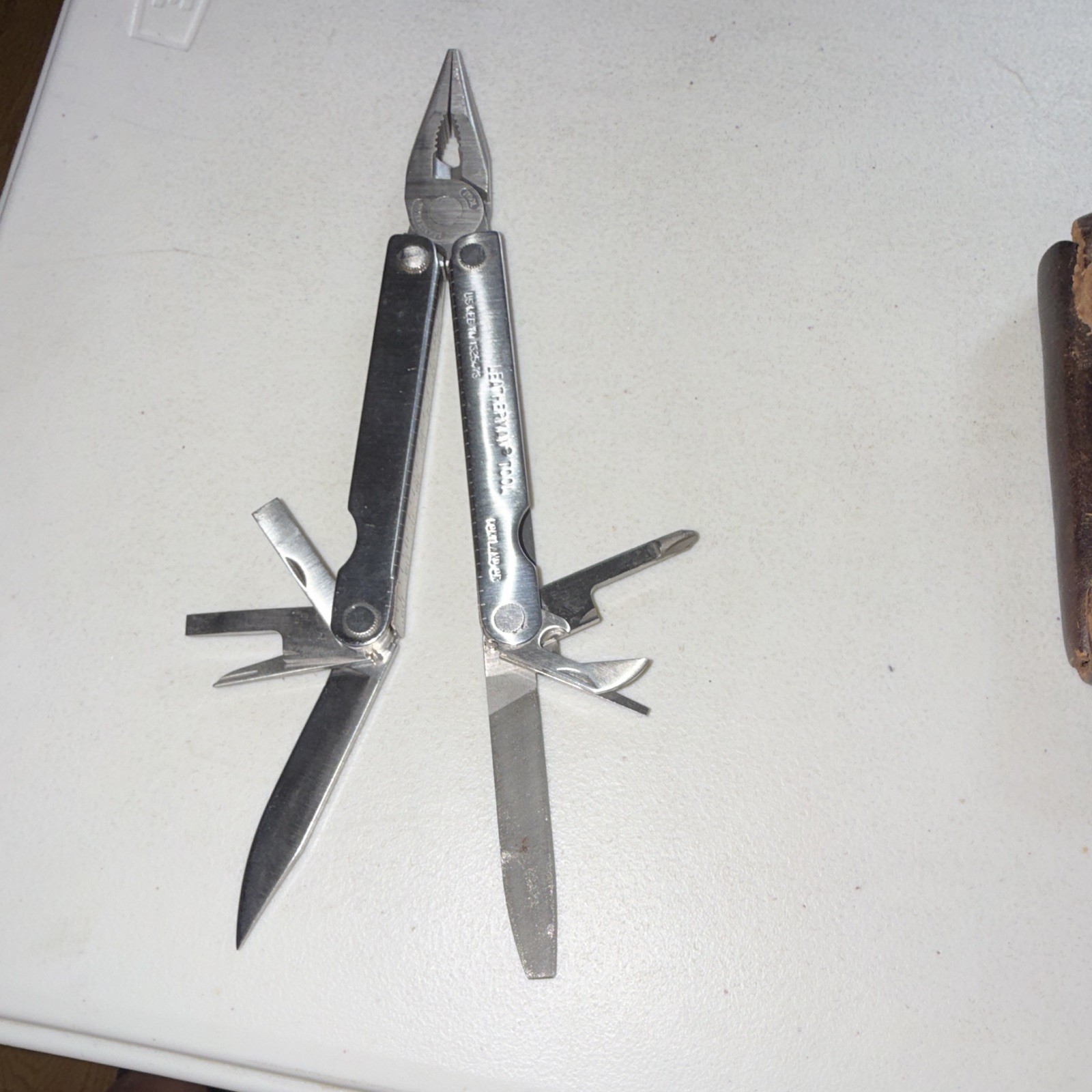 Leatherman Pocket Survival Tool Multi-Tool Pliers Knife File w/ Leather Sheath