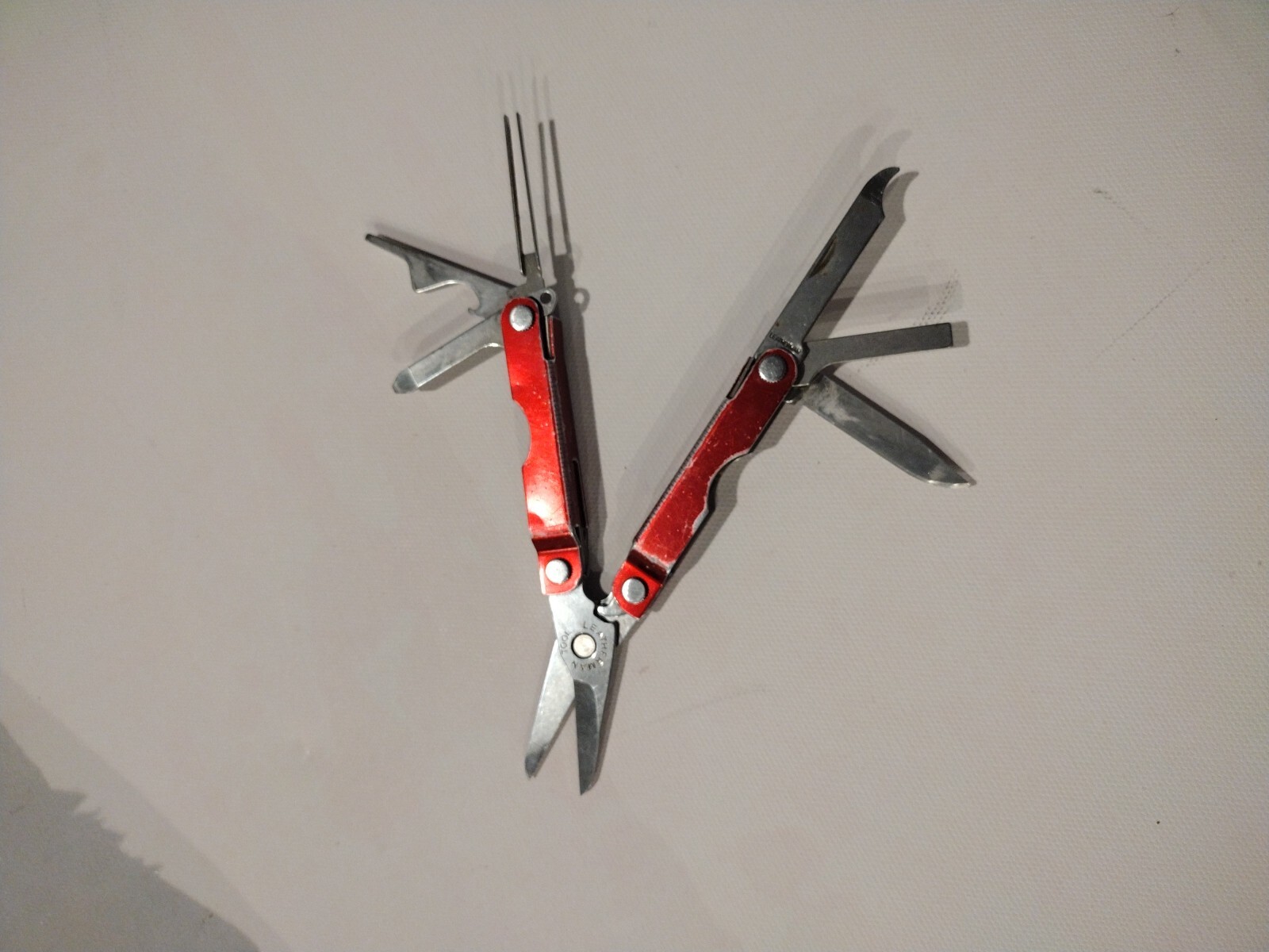 Leatherman Micra Multi-Tool, Knife, Scissors, Key Ring, Red Color in Good Condit