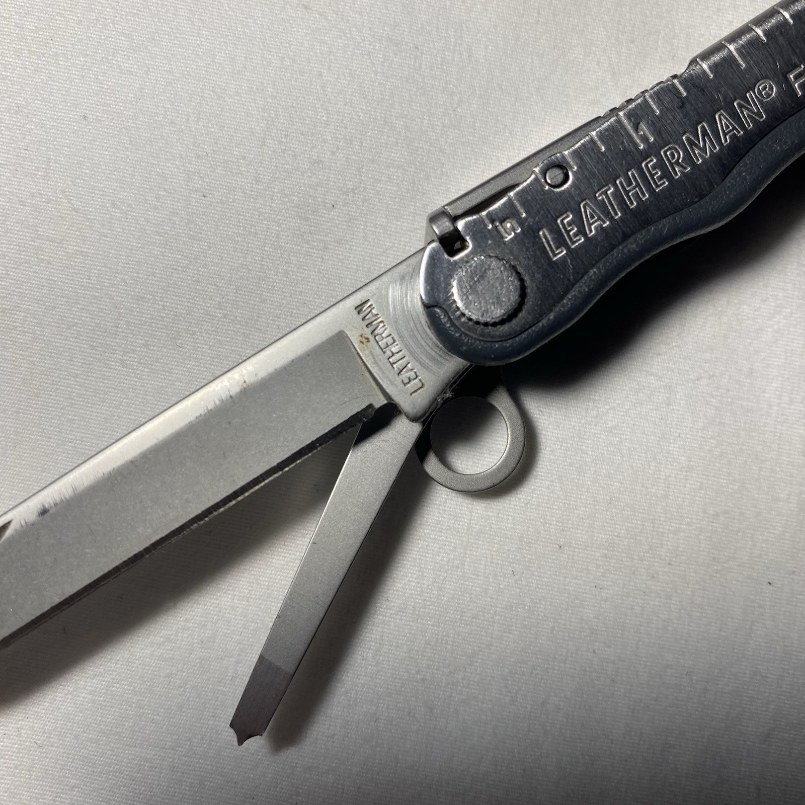 Leatherman Fuse Stainless Steel Folding Multi-Tool, Utility, Chips/Cracks
