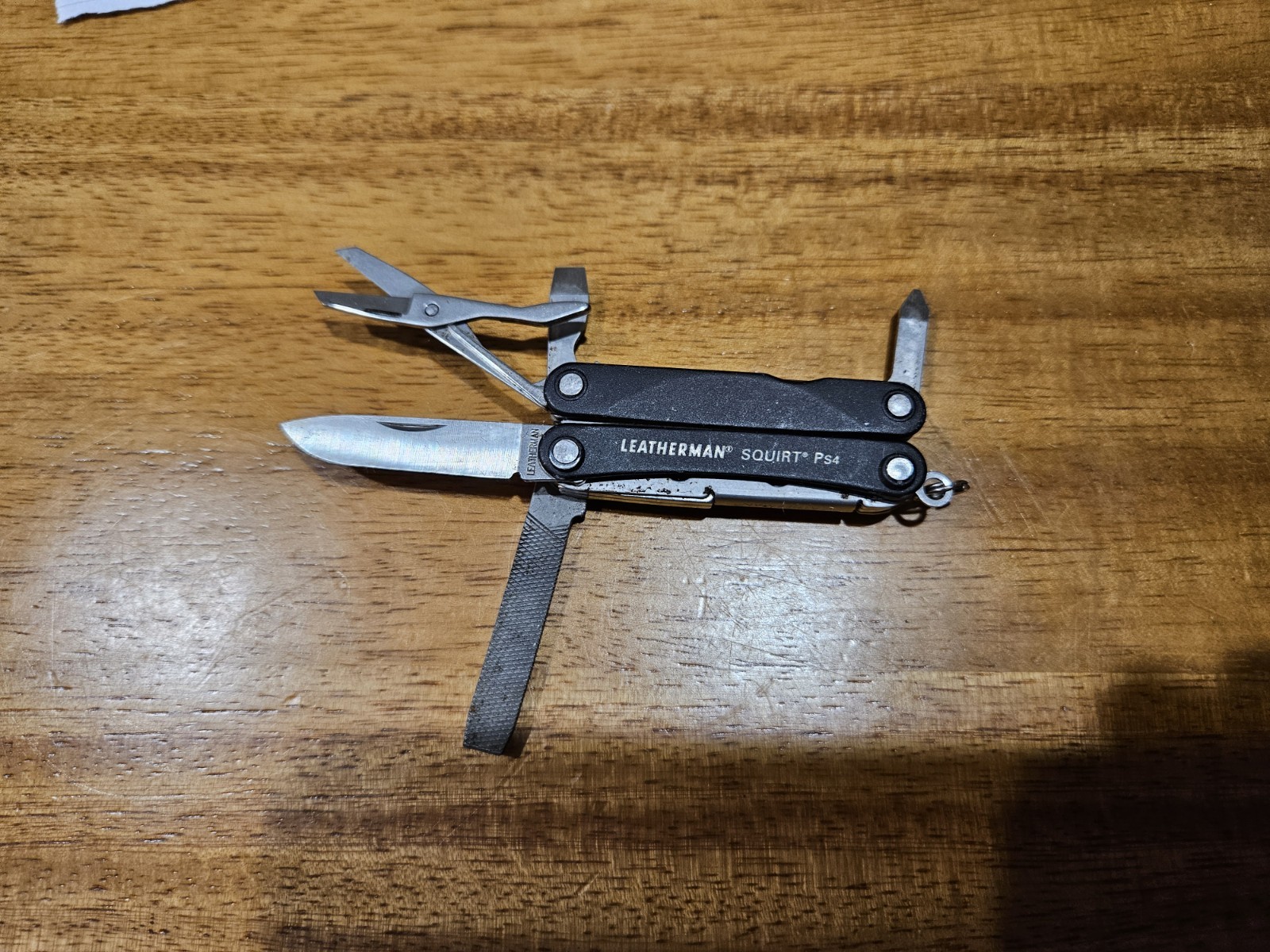 Leatherman Squirt Ps4 Black With Initials Carved In The Handle