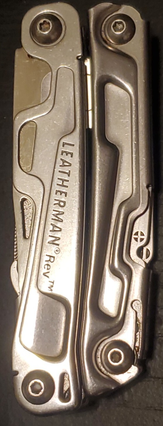 LEATHERMAN REV MULTI-TOOL IS IN MINT CONDITION 024