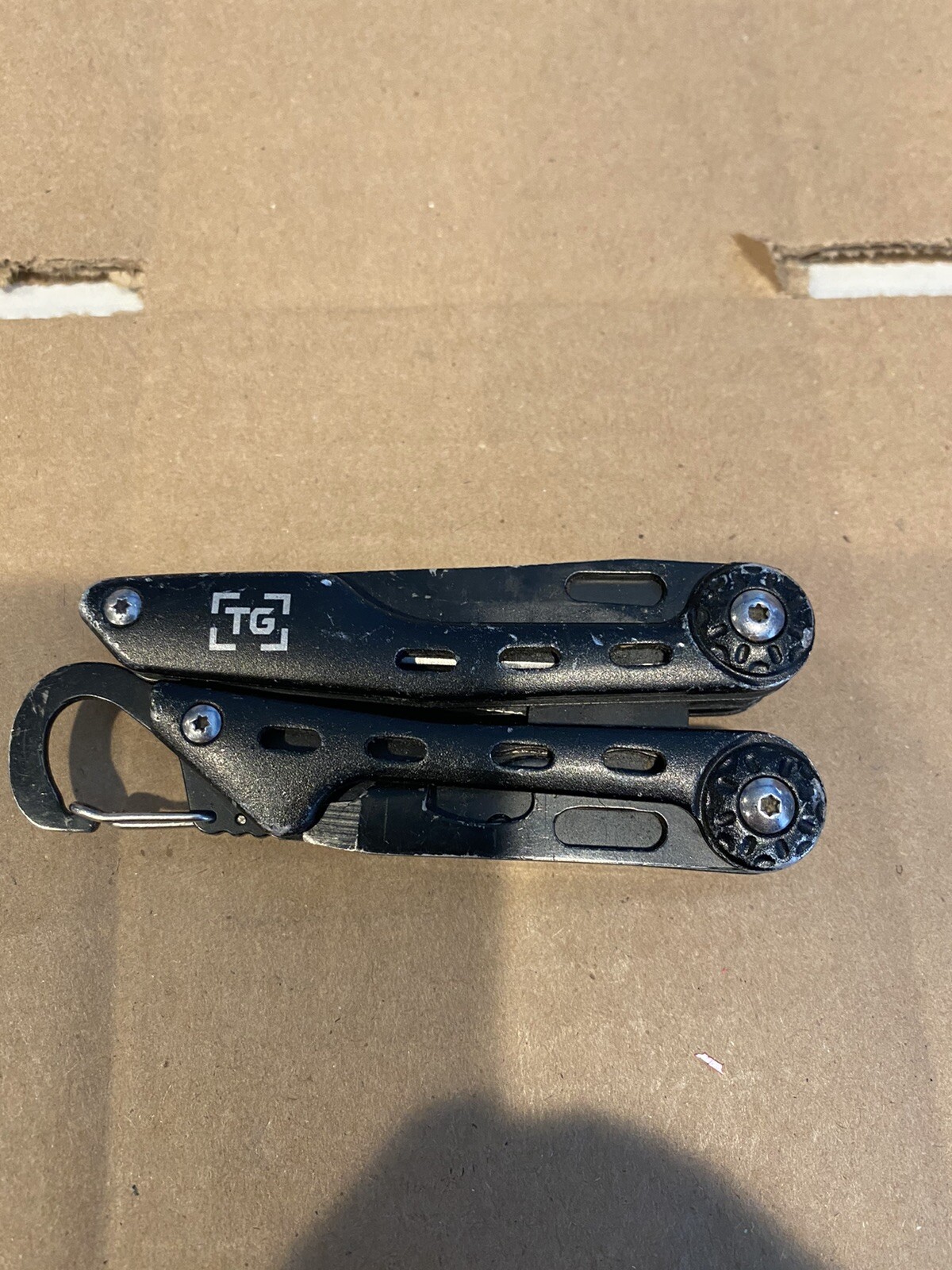 TG multi tool with caribiner