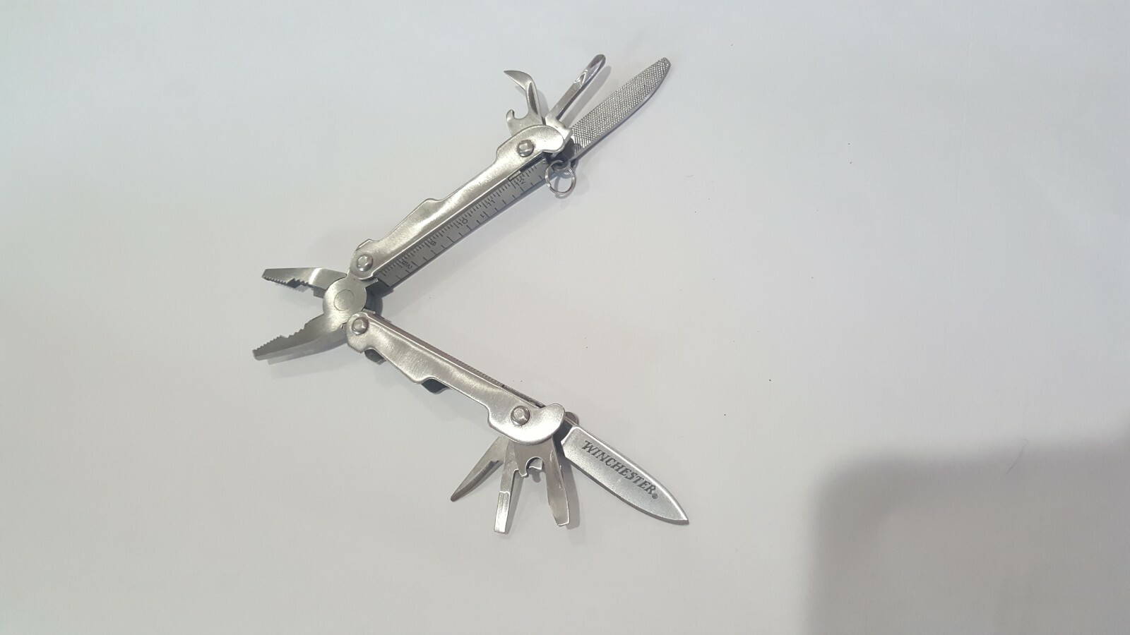 NEW SMARTGEAR 10-FUNCTION HAMMER MULTI-TOOL PLUS USED WINCHESTER MULTITOOL