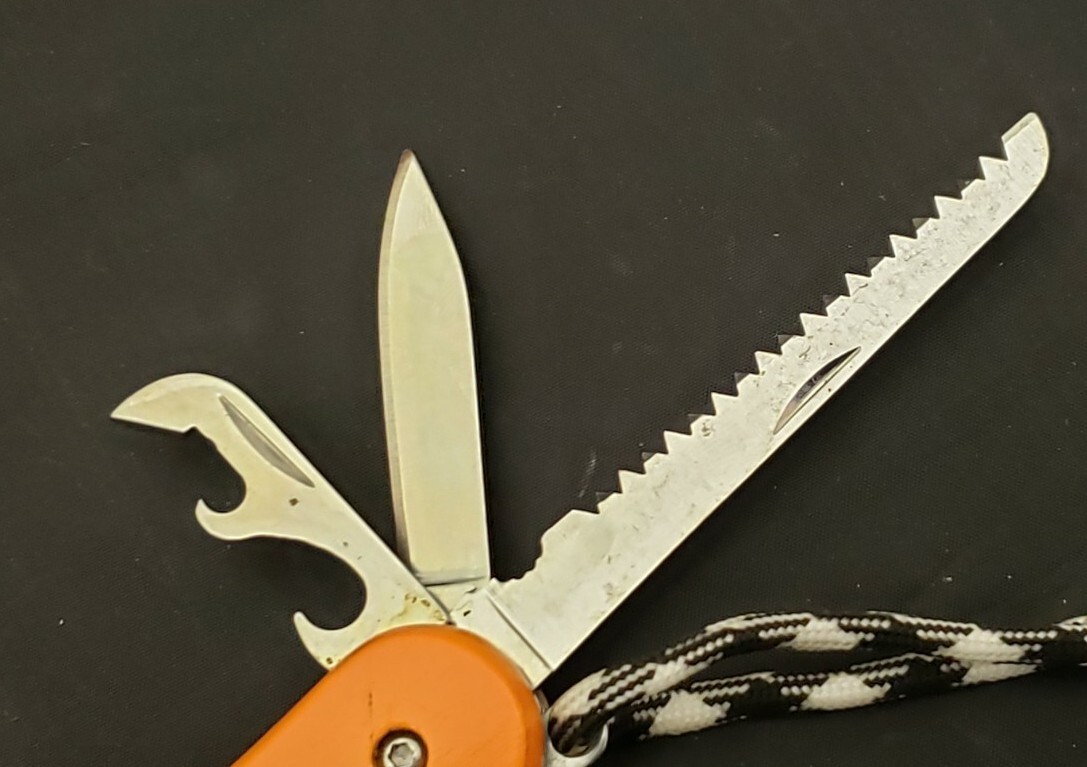 Wild + Wolf 9-in-1 Wilderness Survival Multitool Knife Saw Flint Opener etc