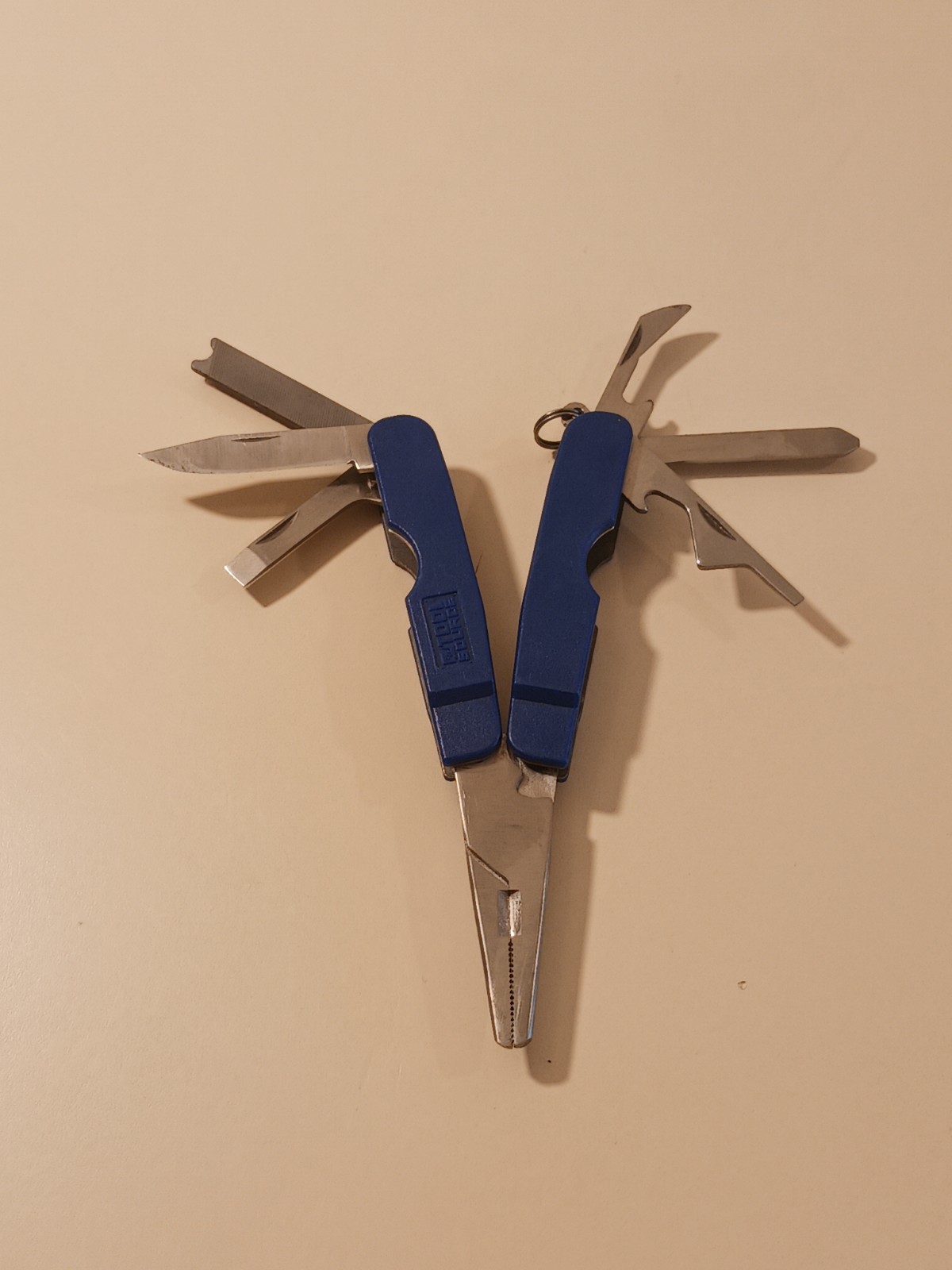 Tool Source 7-in-1 Mini Multi-Tool Pliers Knife Screwdriver File Bottle Opener