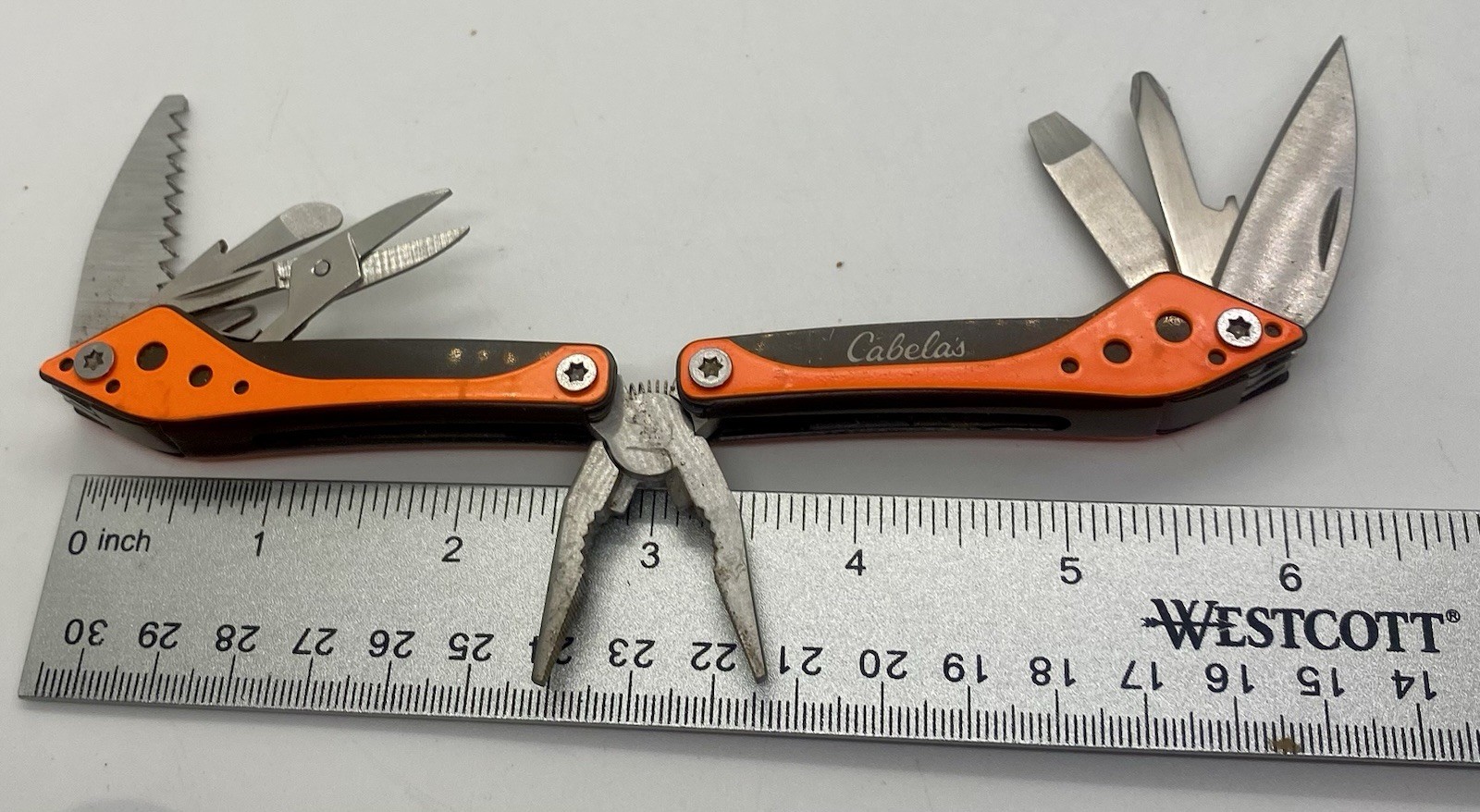 Cabela’s Multi-Tool 7 Tools in 1 Orange Knife Pliers Stainless Steel Black Case