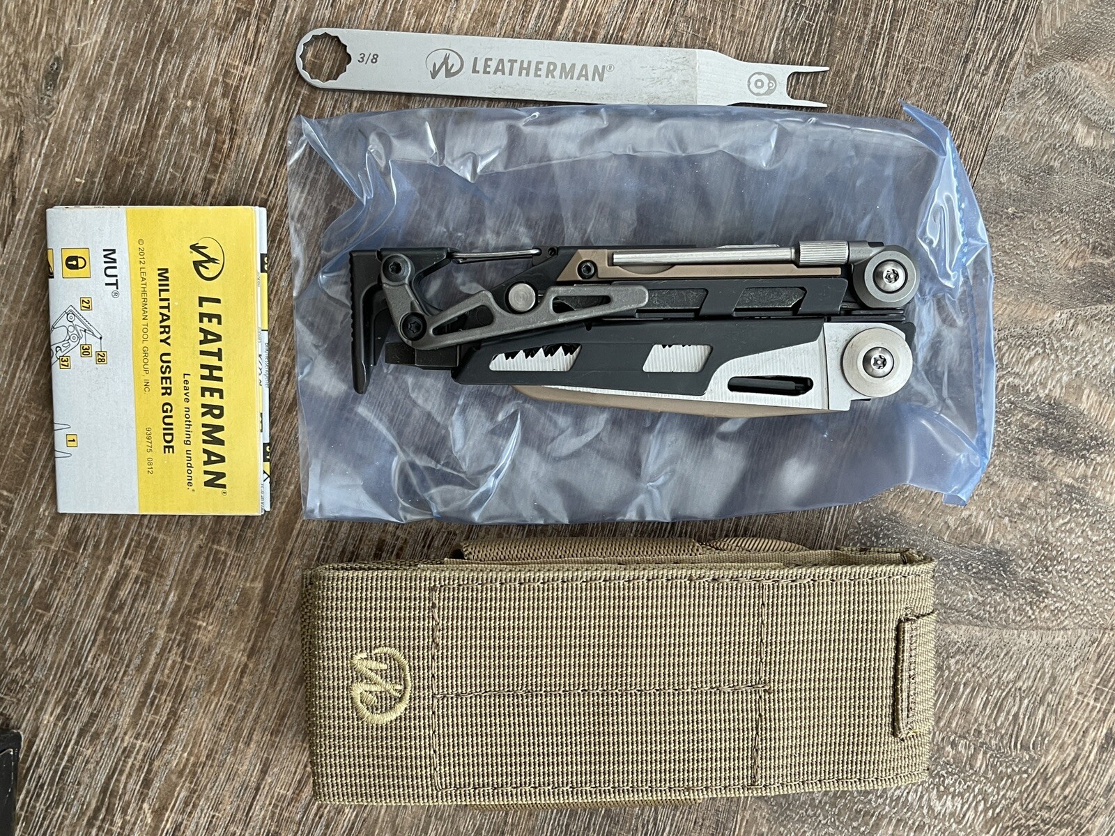 Leatherman MUT w/Titanium Clip multi tool, dark brown molle sheath. Vintage 2013
