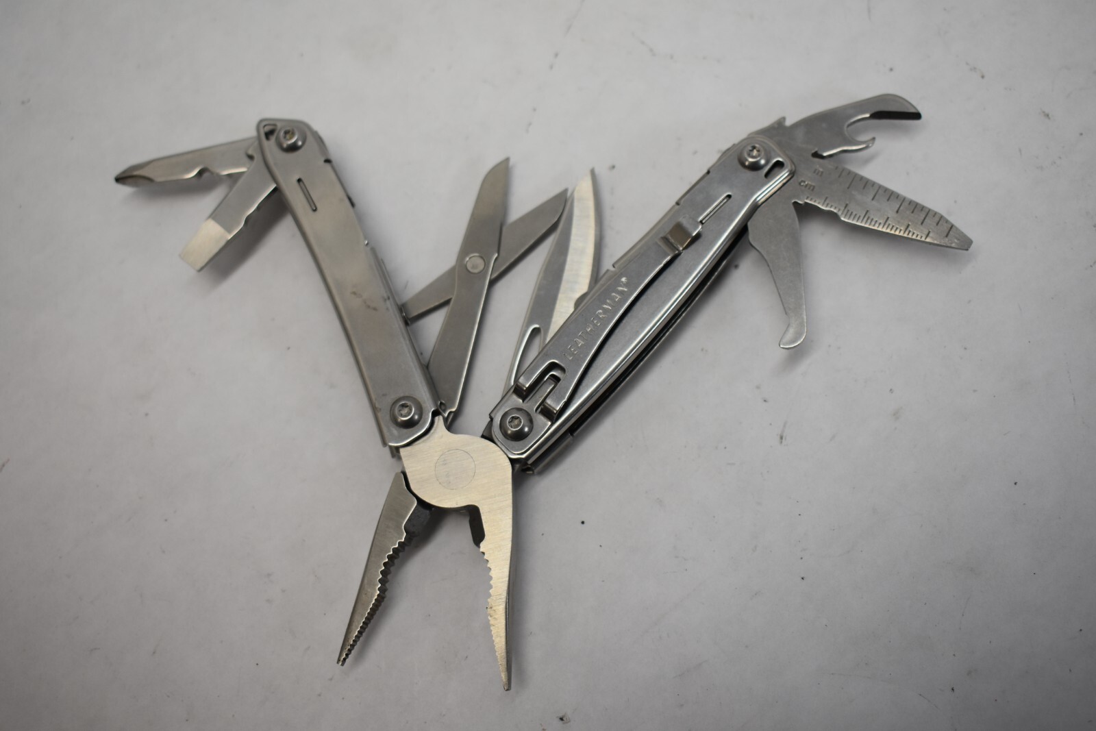 Leatherman Wingman Multi Tool Combo Knife Pliers File Scissors Drivers Openers