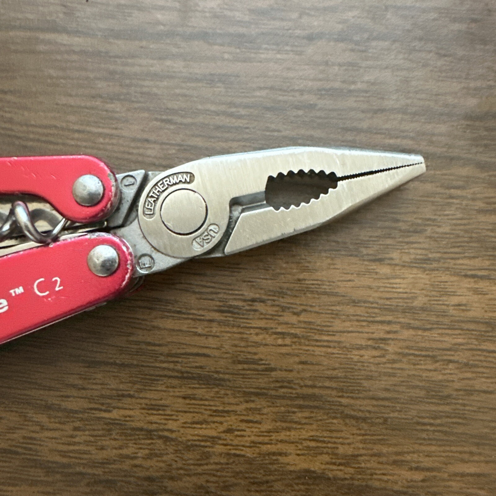 Retired Red Gen 1 Pat pending Leatherman Juice C2 Multitool w/nylon pouch.