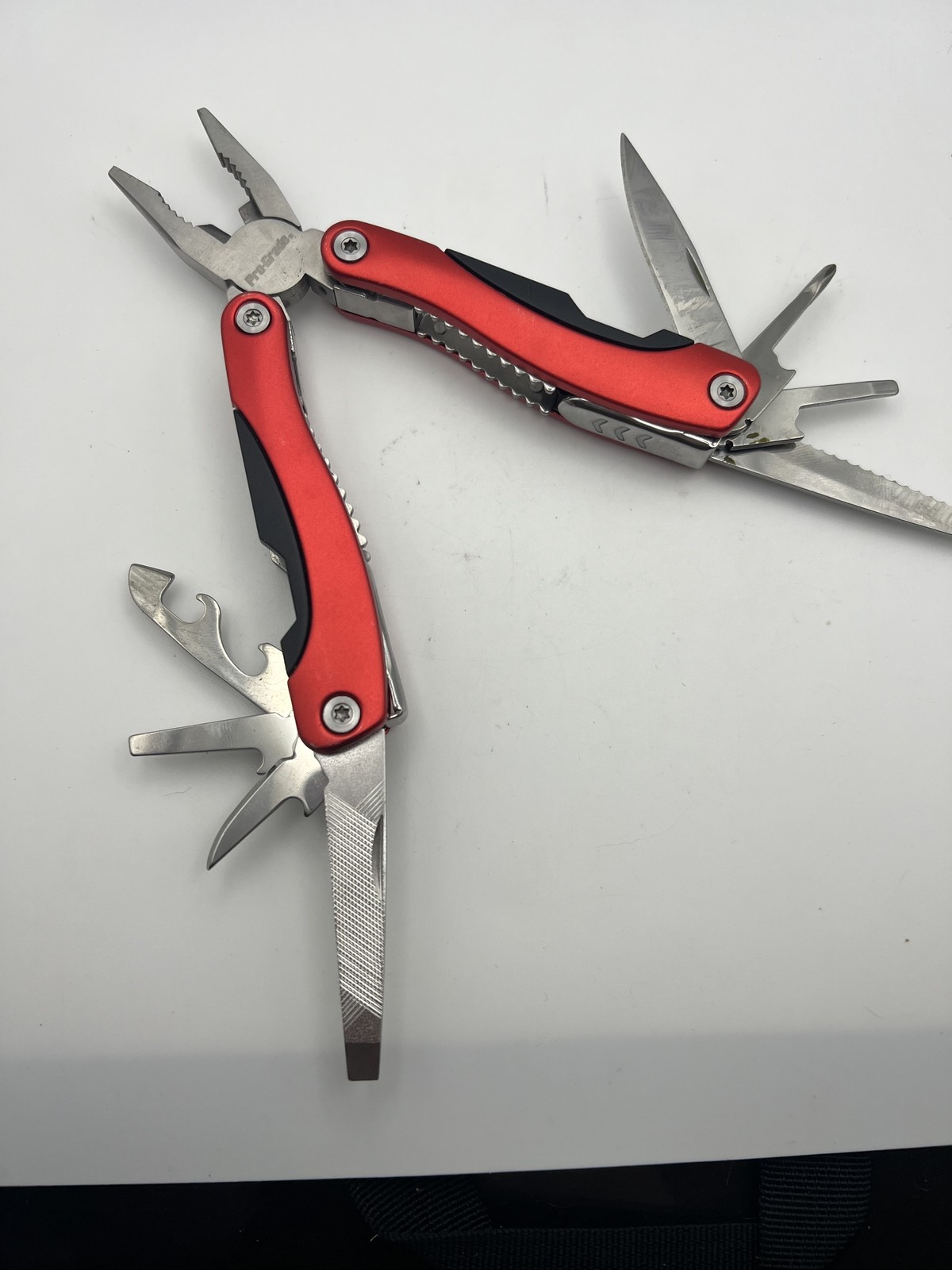 Pro-Grade Multi Tool Folding Pocket Pliers Knife Saw File Bottle Opener with Cas