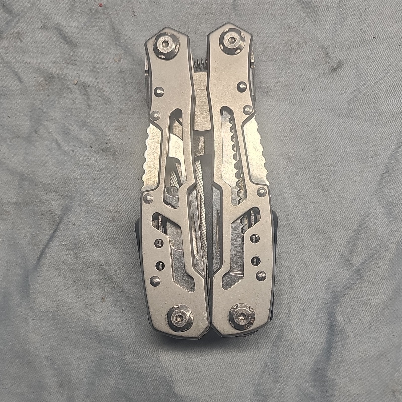 Silver Stainless Steel Multi-Tool with 7 Tools: Plier, Knife, File