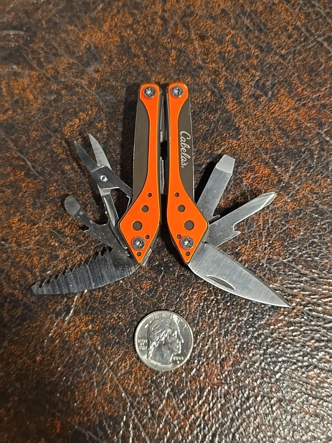 Cabela’s Multi-Tool 7 Tools in 1 Stainless Steel Neon Orange Knife Blade, Pliers